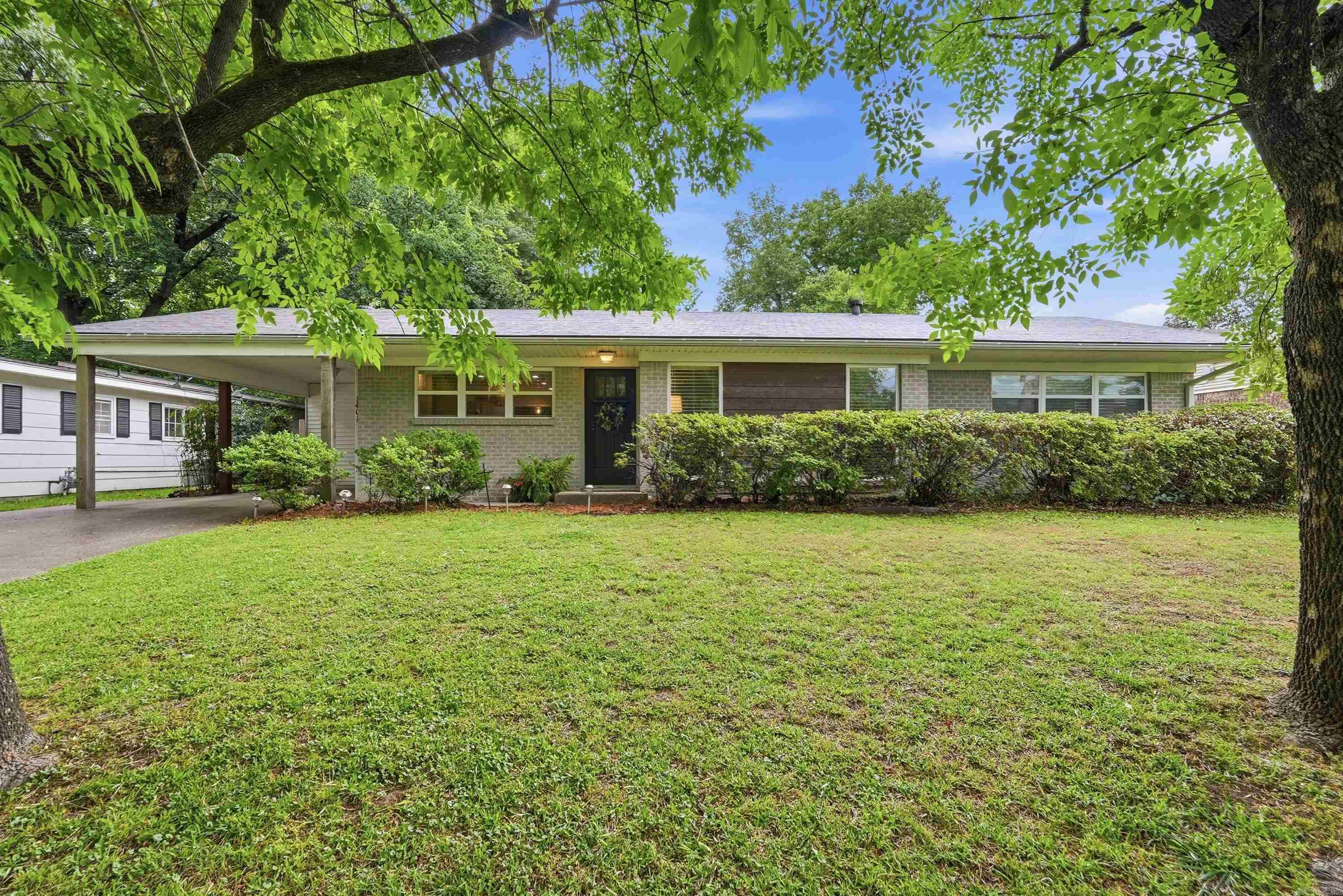 Welcome to 1401 Crystal Drive! This beautifully updated 3-bedroom, 2-bath home was completely remodeled in 2016 and offers the perfect blend of comfort, style, and functionality. The open-concept floor plan features two spacious living areas, ideal for entertaining or everyday living. The generously sized kitchen is equipped with granite countertops, stainless steel appliances, abundant cabinetry, and ample counter space. It overlooks the large second living area, which opens directly to the covered patio and fully fenced backyard—perfect for relaxing or hosting guests. Conveniently located near downtown Benton and situated within the highly desirable Benton School District, this home combines modern updates with a fantastic location