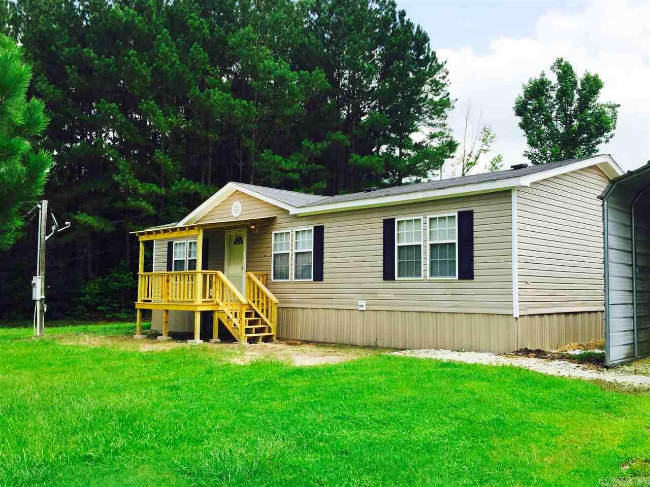 Poyen School District!!! Pretty country setting minutes from Malvern. Property is ready for your livestock. Open feel floor plan, front deck and 2 large storage areas is perfect for the family.