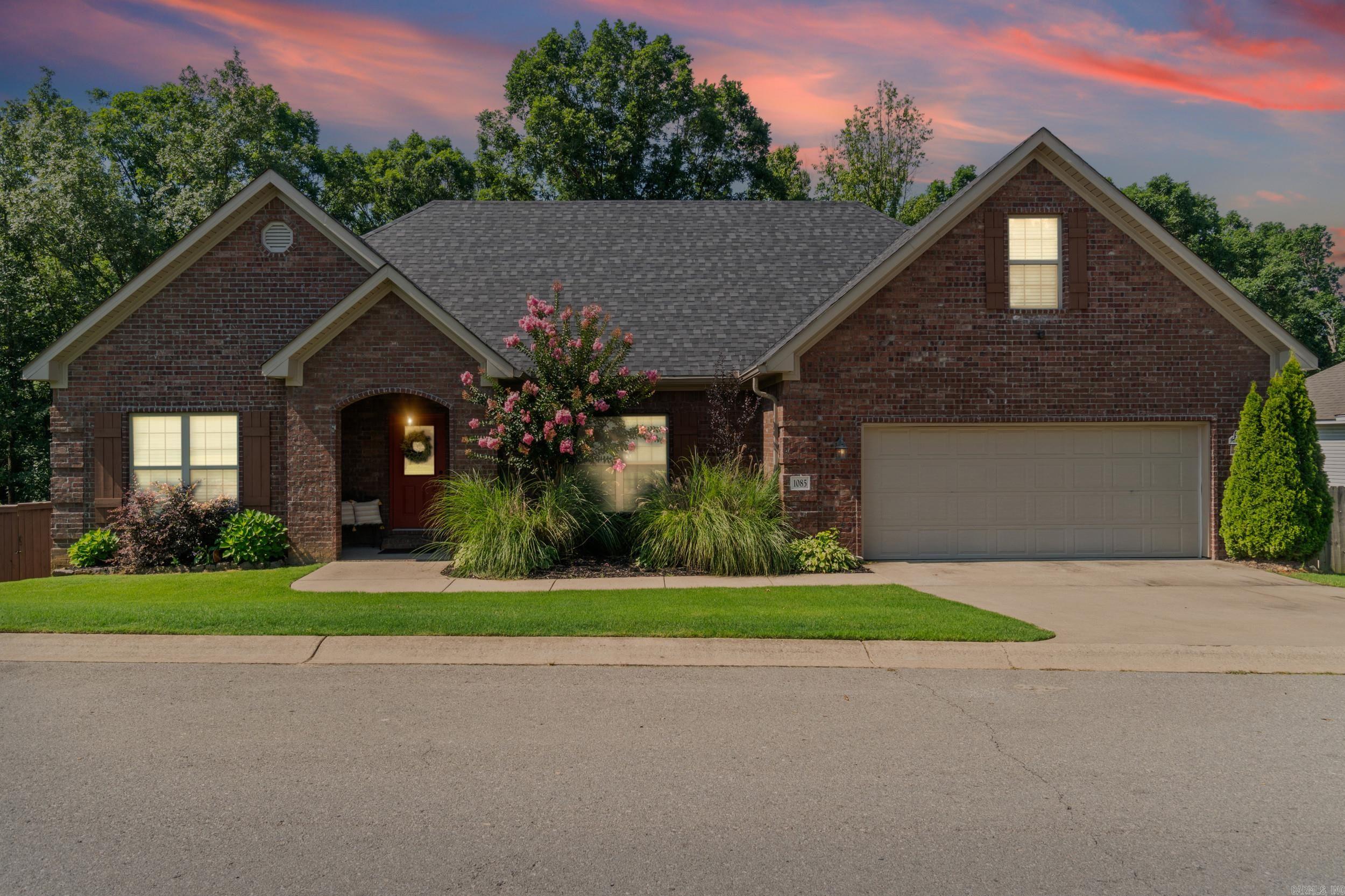 Tucked away on a quiet cul-de-sac, this beautifully maintained home offers the perfect combination of privacy, comfort, and many updates. From the moment you arrive, you’ll appreciate the inviting curb appeal and peaceful setting. Step inside to discover spacious living areas featuring recessed lighting, a warm fireplace, and an open layout that’s perfect for both everyday living and entertaining. The kitchen flows seamlessly into the living and dining spaces, while the updated primary suite provides a relaxing retreat with a stunning spa-inspired bath. Outside, enjoy your own private oasis with a fully fenced backyard, mature landscaping, a sprinkler system to keep the lawn looking its best, and a storage building for all your outdoor essentials. Major updates have already been completed for peace of mind, including a new roof and newer HVAC system, allowing you to move in with confidence. If you’ve been searching for a home that offers modern updates, privacy, and a fantastic location just minutes from Bryant and Little Rock, 1085 Mountainside Cove is one you won’t want to miss. Open House Sunday July 12th from 2-4. Private showings start Monday July 13th.