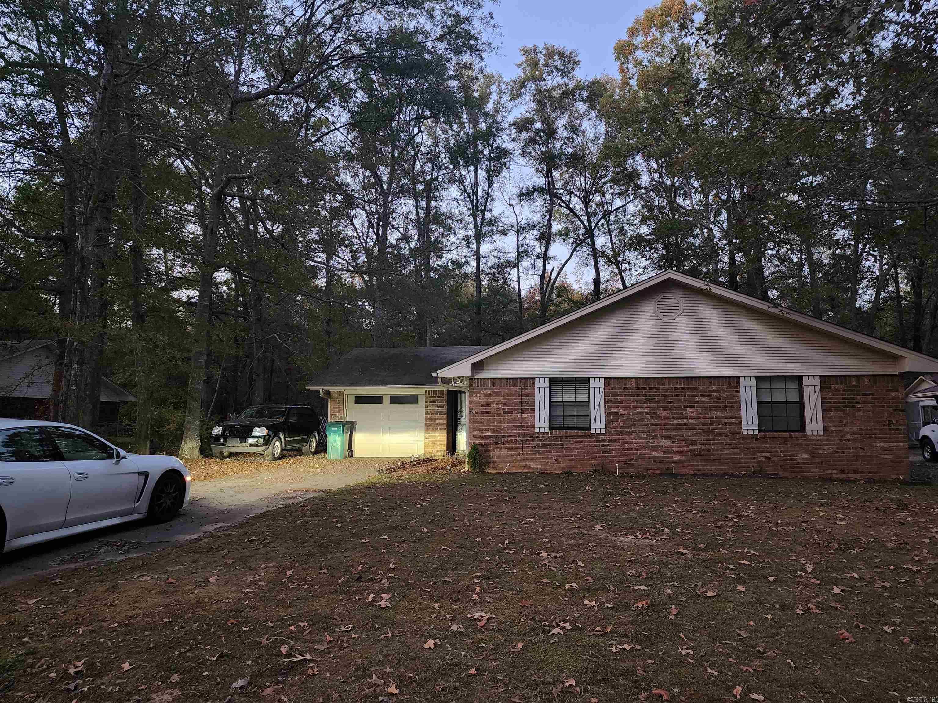 You're invited to experience all that this home has to offer! Welcome to this warm, cozy, and inviting home. It's located in an older established neighborhood almost secluded with all the modern conveniences. It is located close to everything including shopping, restaurants, schools, and much much more.  It boasts 3 nice-sized bedrooms, 2 full baths, a nice-sized living area, kitchen with a breakfast nook and a 1-car garage. It has been updated with new flooring & paint. It also has plenty of backyard space. This home is a perfect starter home. Call today to view this lovely property. Agents see remarks.