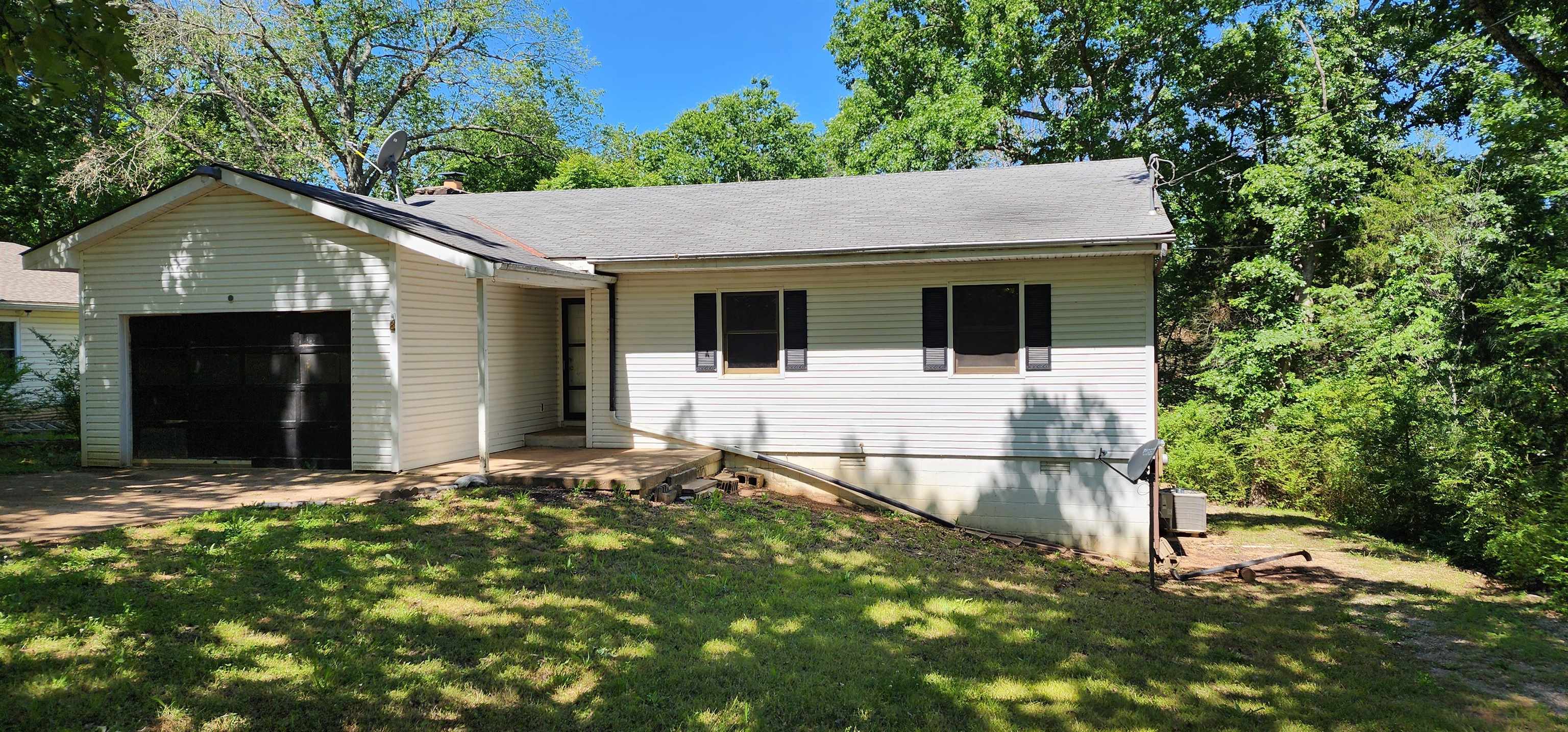 Over 1300 square feet of prime fixer-upper potential! This 3 bed 1 and 3/4 bath is located in the heart of Cherokee Village, walking distance to Papoose Park and Lake Cherokee! Already partially stripped, this home is a fantastic canvas for someone to transform into a dream home!