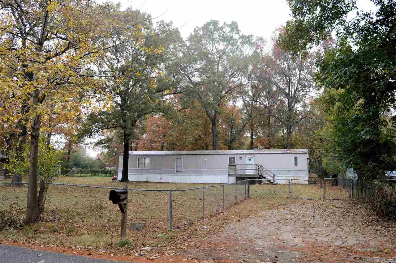 Investors take notice!  Home has been steadily rented for many years.  New counter-tops in kitchen and seller will do a flooring allowance up to 2500.00 with an acceptable offer.  Open Floor-plan with FP in great-room.  Great peaceful lot in the heart of Bryant.