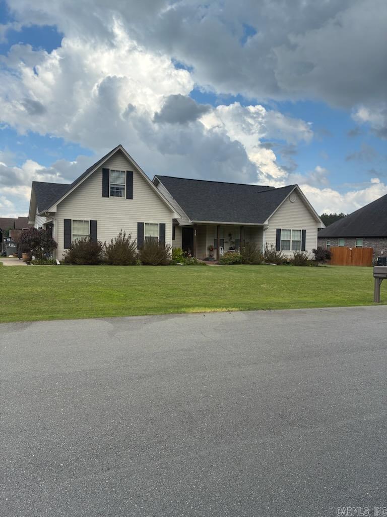 This 3bed 2bath home is located in Fecher Prairie Meadows right off of Hwy 64. The spacious 1950 sq ft floor plan features a large kitchen with tons of cabinets, counter space, bar and dining area. You can relax in the living area and enjoy cozying up in front of the fireplace! The master suite was built with comfort in mind with its oversized space and the bath has double vanity, separate shower, soaking tub and two walk in closets. The home has a 2-car garage and a bonus room upstairs that could be used for so many things. The back yard is fully fenced and has a 12x14 storage shed, 36' above ground pool, and 18x35 carport. New A/C and Water Heater in 2020 and New Roof in 2025