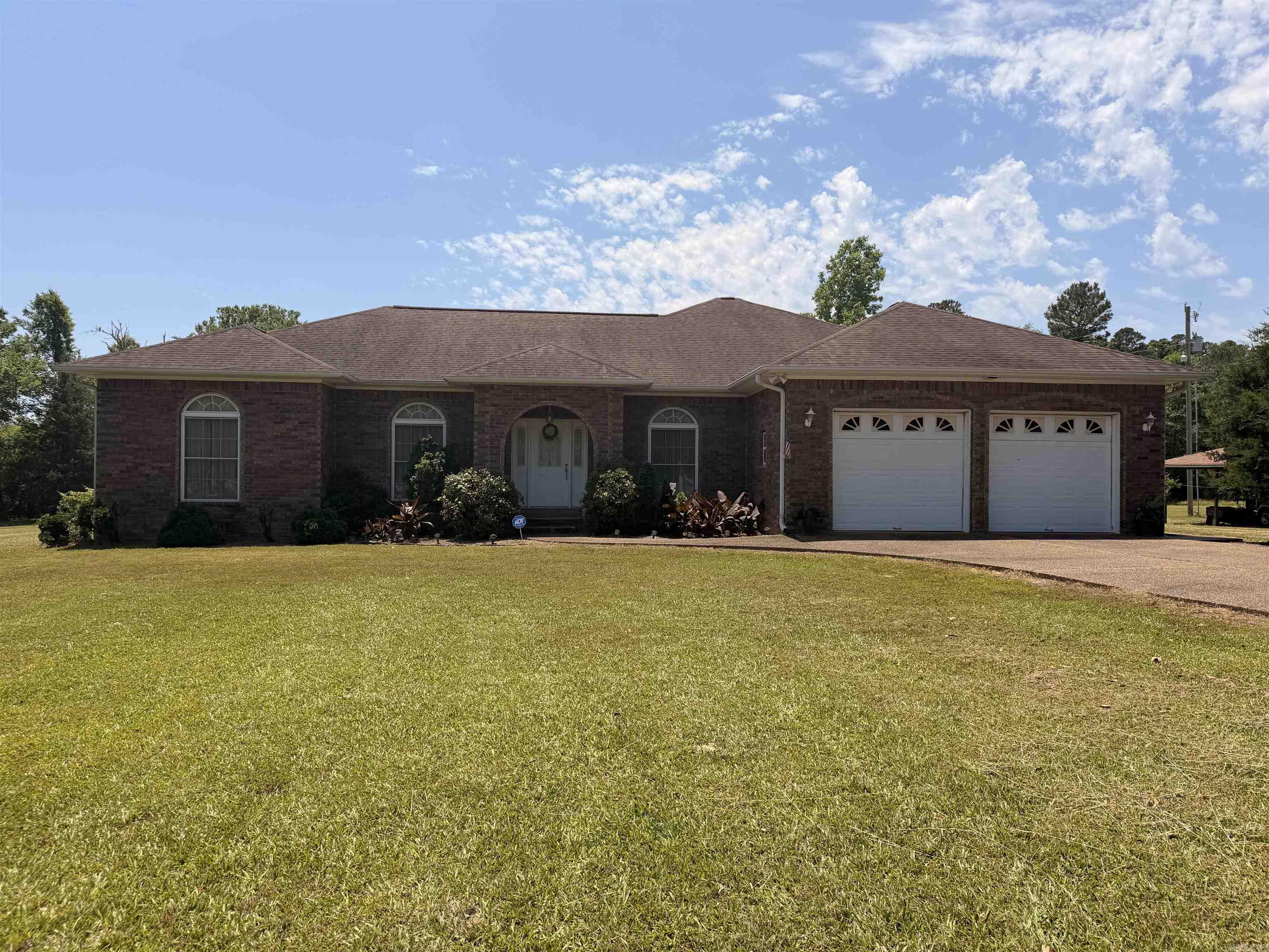 Well kept house on 9.81 acres with formal living room and dining room, separate sitting area in master bedroom and screened-in back porch.  Property also includes a separate, detached guest house, hot tub, storage shed, enclosed RV storage and pond.  Guest house is 840 sq ft. Storage shed is 16x30’. RV storage is 16x48’ with 14’ ceiling. About 6 acres of timberland.