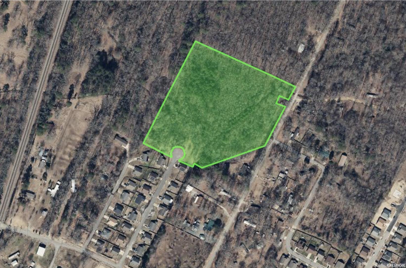 Prime 7.5± acre wooded tract in the path of growth! Located less than 3 miles from the new Buc-ee's development, this property offers outstanding future potential in one of Saline County's most active growth areas. Ideal for investors, developers or those looking to secure acreage near major commercial expansion. Accessible from two separate streets. Portions of the property may require fill and site work depending on intended use. Rare opportunity to acquire acreage in a rapidly developing location.