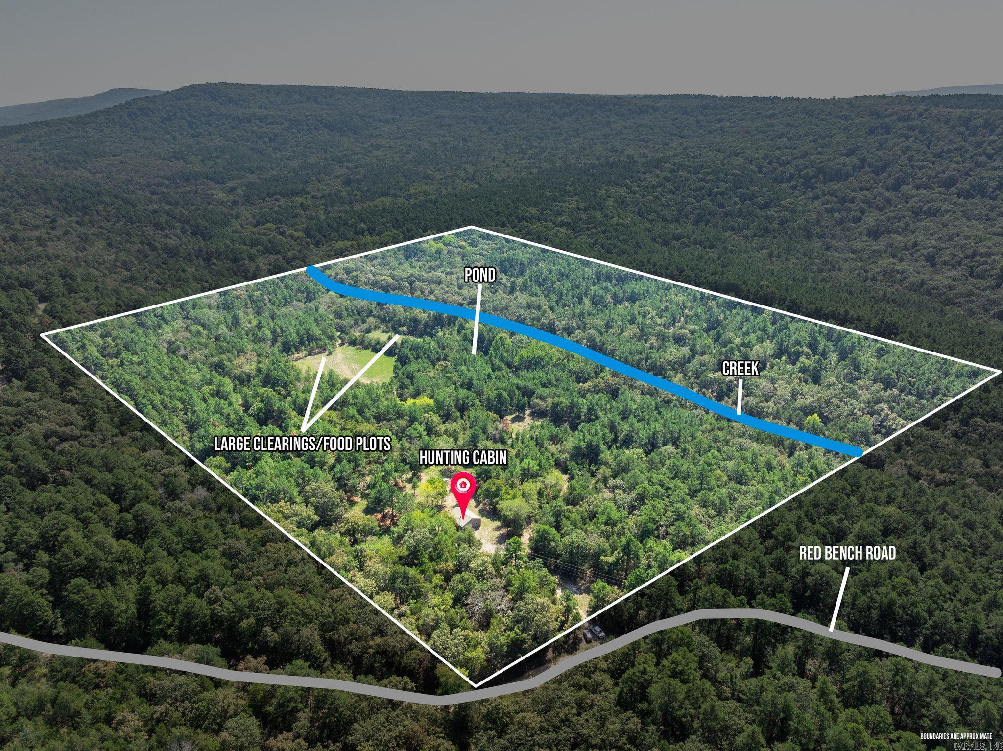 40 Acres of Prime Hunting Grounds near Mount Magazine! Get ready to own your hunters paradise. Surrounded by the Ozark National Forest, this paradise offers seclusion and unforgettable hunting experiences. This piece of land has it all. *Key Features:* 40 acres of prime hunting land -Surrounded by National Forest for added seclusion and hunting opportunity-Highly manicured food plots to increase habitat for deer, turkeys bear  - Precision-cut shooting lanes-Strategically placed tree stands for the ultimate hunting experience -Road Frontage -creek has water most of the year and makes a great water source *The Hunting Cabin:* -Hunting cabin renovated from top to bottom with all new plumbing and modern amenities ensuring a comfortable stay-Perfect retreat after a long day of hunting. Location:Close proximity to Mount Magazine, offering scenic views and outdoor recreation opportunities- Paris, Arkansas, provides easy access to amenities and services  Game Species -great Deer heard-abundance of Bear - great turkey population * Don't miss this rare opportunity to own a piece of hunting property!   Drone Footage: https://listings.premierphotoco.com/video/QUIz01AeVTrbDDMHpM02OaLH2jebZ