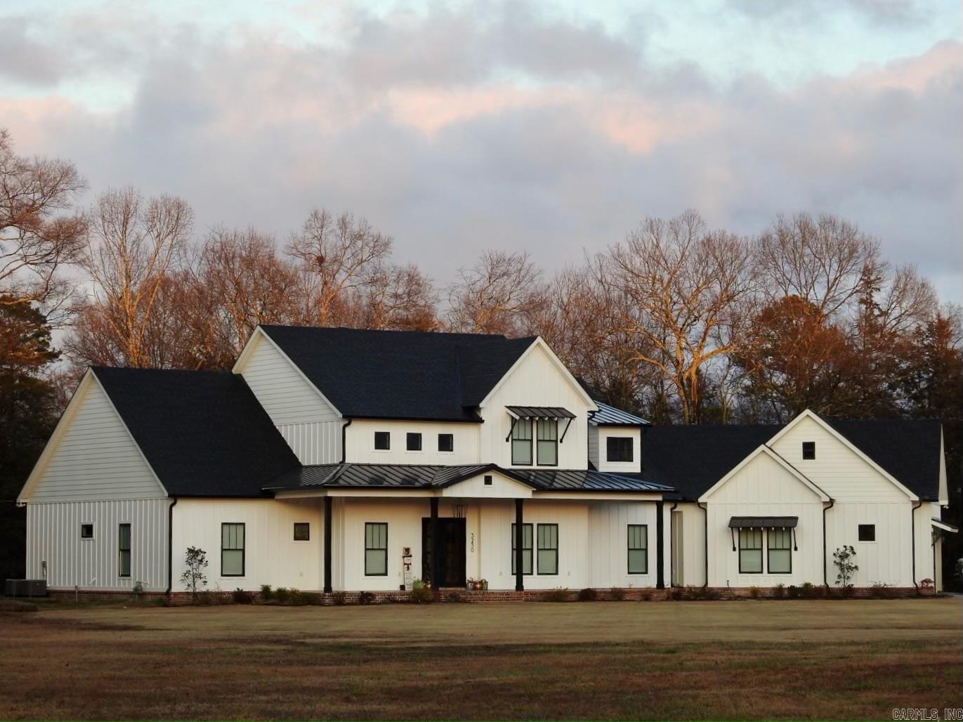 Spacious 4 bed, 3 1/2 bath home built by Drew Hester Construction. This home sits on 6.43 acres in East Conway-3miles from I-40 & Lewis Crossing shopping center. The home is located in the cul-de-sac of a 1 street neighborhood. In addition to its wonderful location, the home boasts a 30x40 shop with heated/cooled office, large L shape pool with sun deck built in 2021 and surrounded by a black iron fence. Within the home you will find an office with lots of organization, gun room with safe door, upstairs bonus room and 4th bedroom and bath, hidden pantry, large walk-in closet that connects to master suite, and an open floor plan that is great for family time and hosting.
