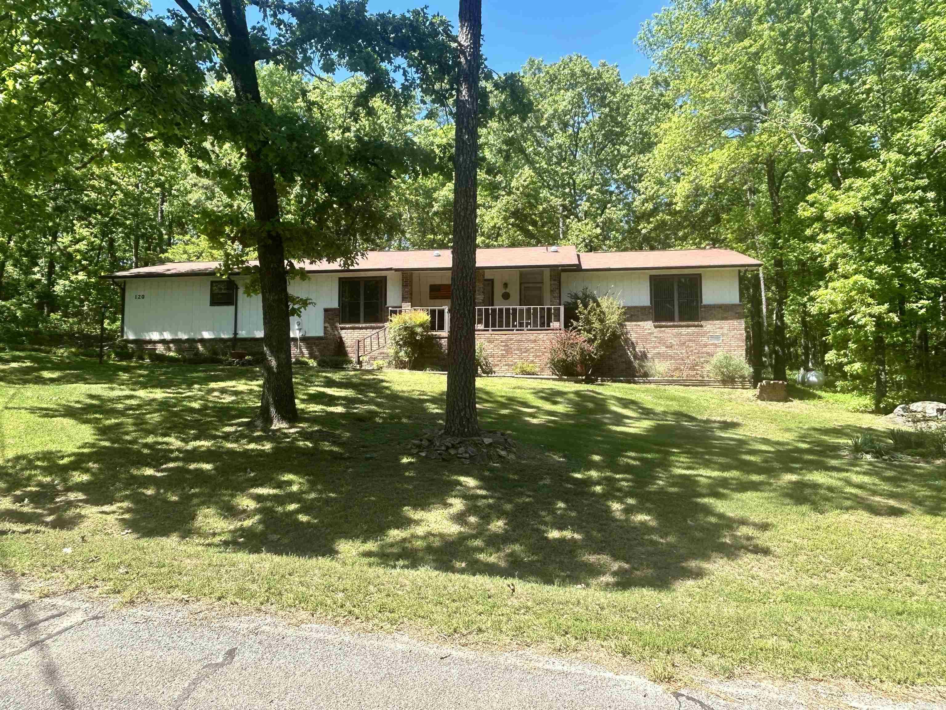 Welcome to this well maintained 3 Bd 2 Bath home in Fairfield Bay. This home offers comfort, charm, and a peaceful setting surrounded by great landscaping. The spacious living room is perfect for relaxing with a fire in the gas fireplace. The kitchen offers plenty of cabinet space and functionality. The primary bedroom has a private bath and generous closet space. Many small upgrades completed. Take advantage of all Fairfield Bay amenities including golf courses, pools, trails, marina access, and more. Perfect as a full-time residence, vacation home, or investment opportunity!
