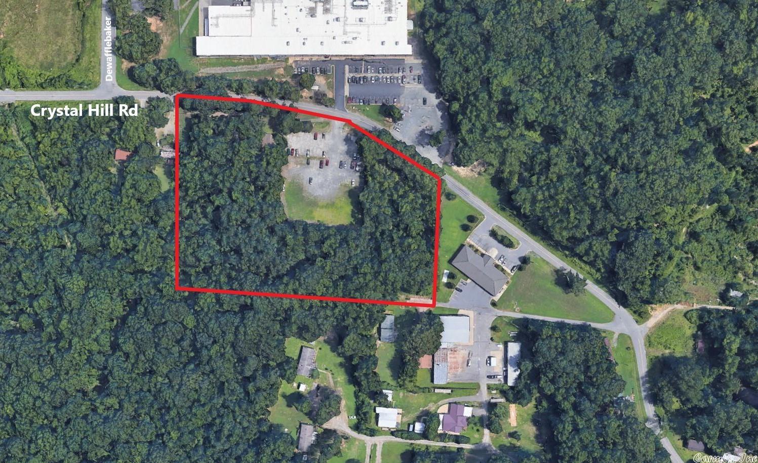 6.14+/- level acres for commercial development along Crystal Hill Road at border of North Little Rock and Maumelle. Surrounded by businesses & I-1 zoning for a wide variety of commercial development options! Ingress/egress in place and utilities to the site. See brochure, zoning map, and permitted uses in Documents.