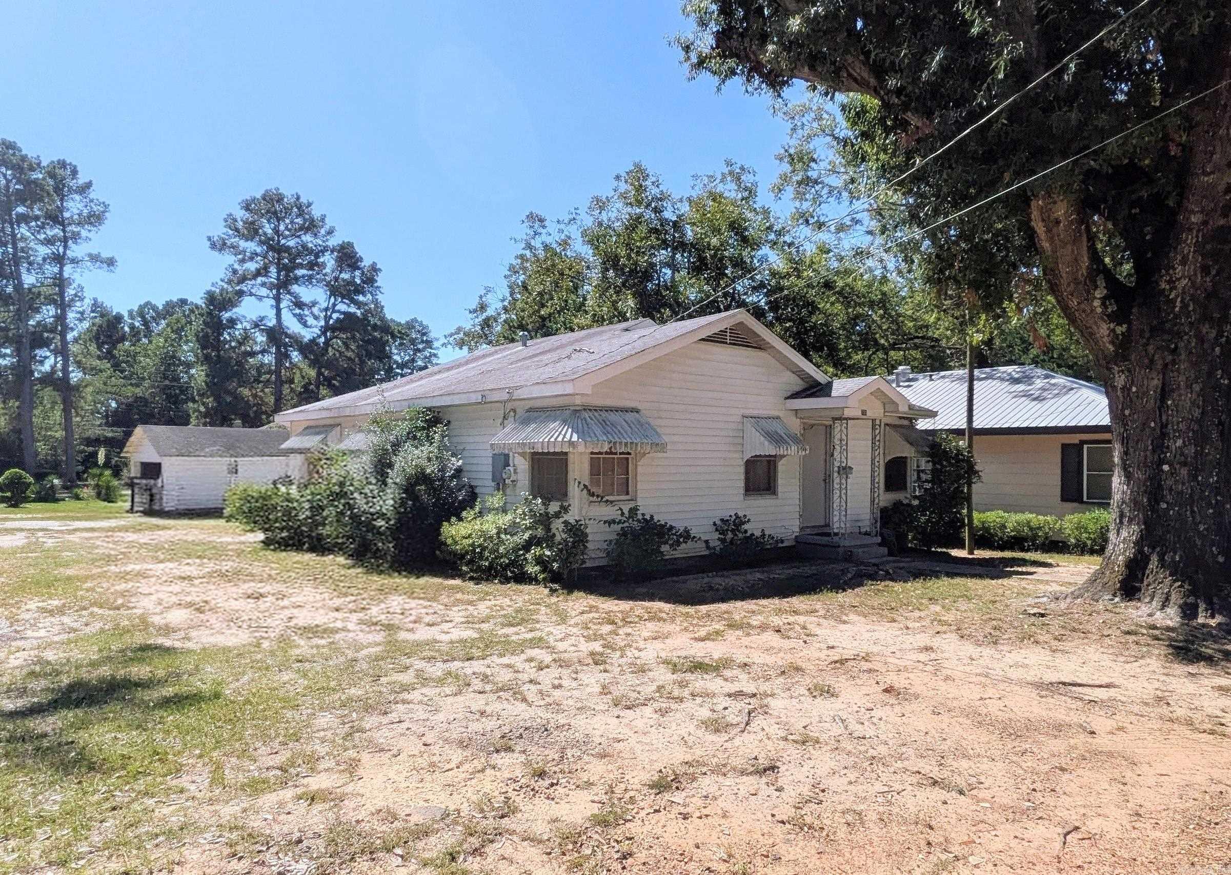 This 3 bedroom, 2 bath home sits on a corner lot. The property features a living room, dining room, & plenty of potential for updates to make it your own. This home is perfect for investors looking for immediate income or for buyers ready to customize your home. Don't miss this chance to broaden your investment portfolio. Square footage, lot size, and acreage is taken from courthouse records.