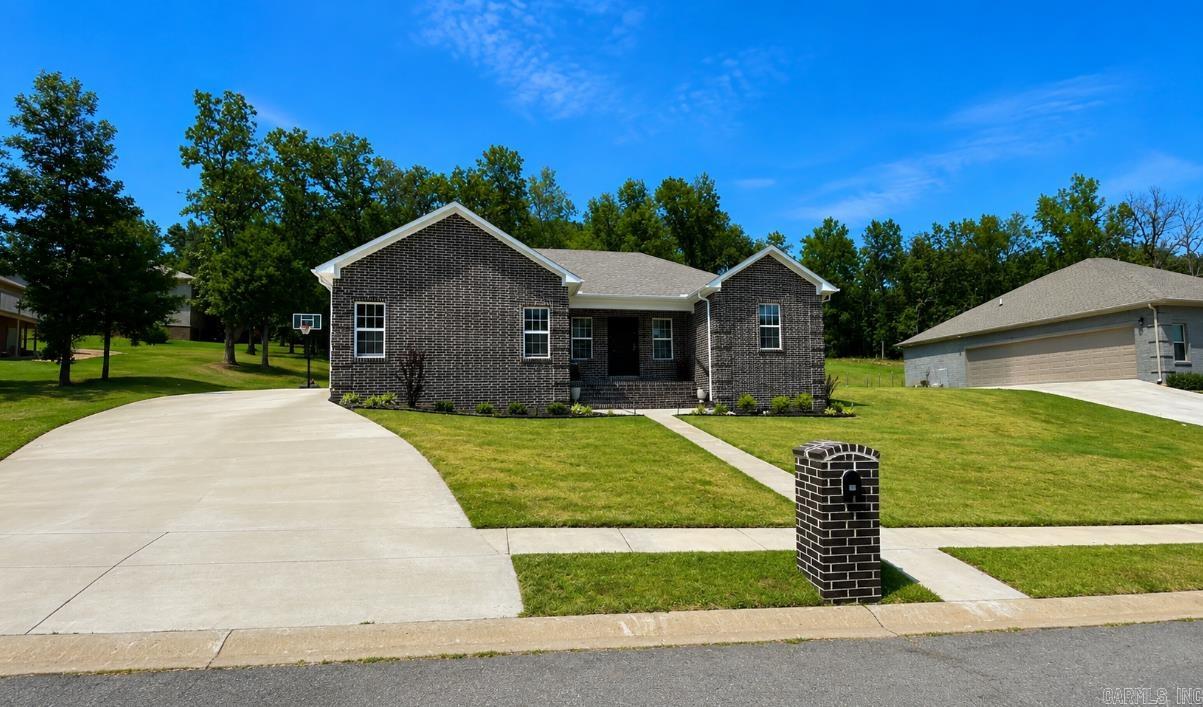 This home takes full advantage of the best Cabot has to offer. Nestled on nearly a half-acre with easy interstate access, this beautifully maintained  home features a modern design, gorgeous cabinetry, waterproof laminate flooring, a tiled walk-in shower, and a spacious backyard perfect for entertaining. Previously used as a high traffic Airbnb/VRBO rental, it offers excellent potential as a primary residence or investment property.   Security system  equipment will convey, buyer can opt into a subscription plan to cover the cost of service with May Security.