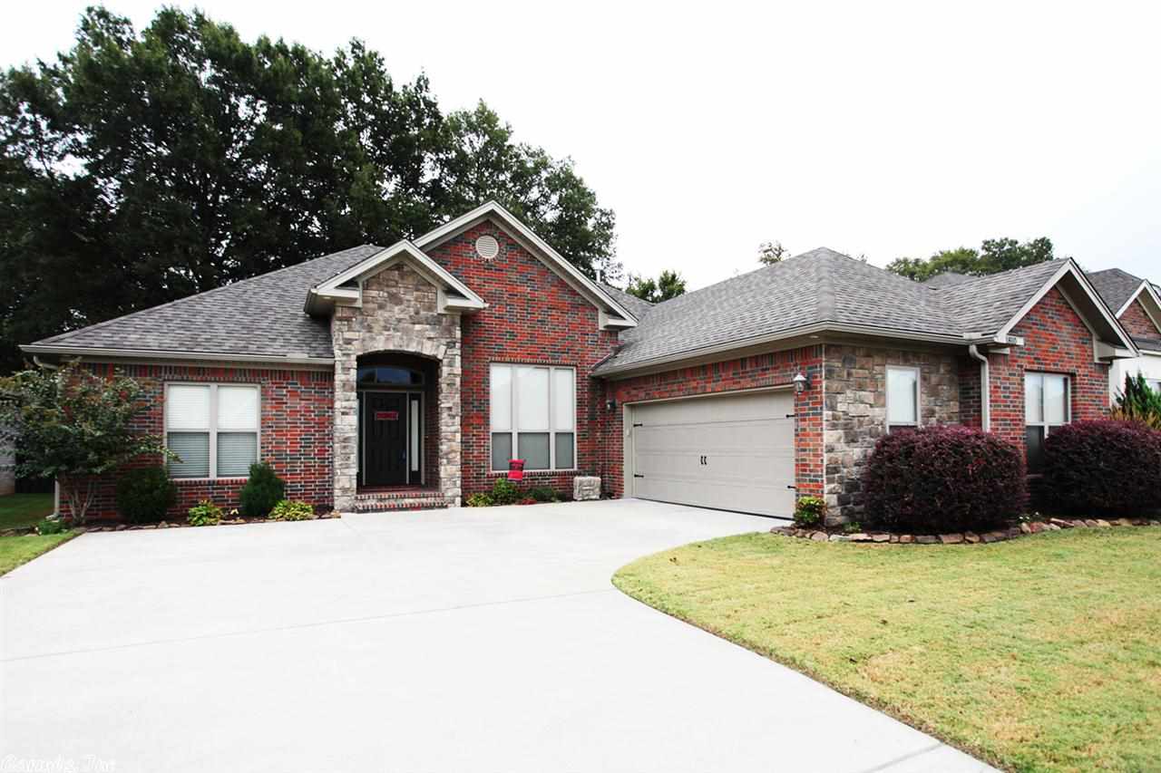 Designed with Pride! Gleaming hardwood floors throughout with the exception of carpet in the bedrooms and tile in bathrooms. Large living area open to the beautiful kitchen with granite countertops and walk in pantry. Formal dining room, fully fenced shaded back yard with a fenced in are for your fluffy pet. Make this your new home.