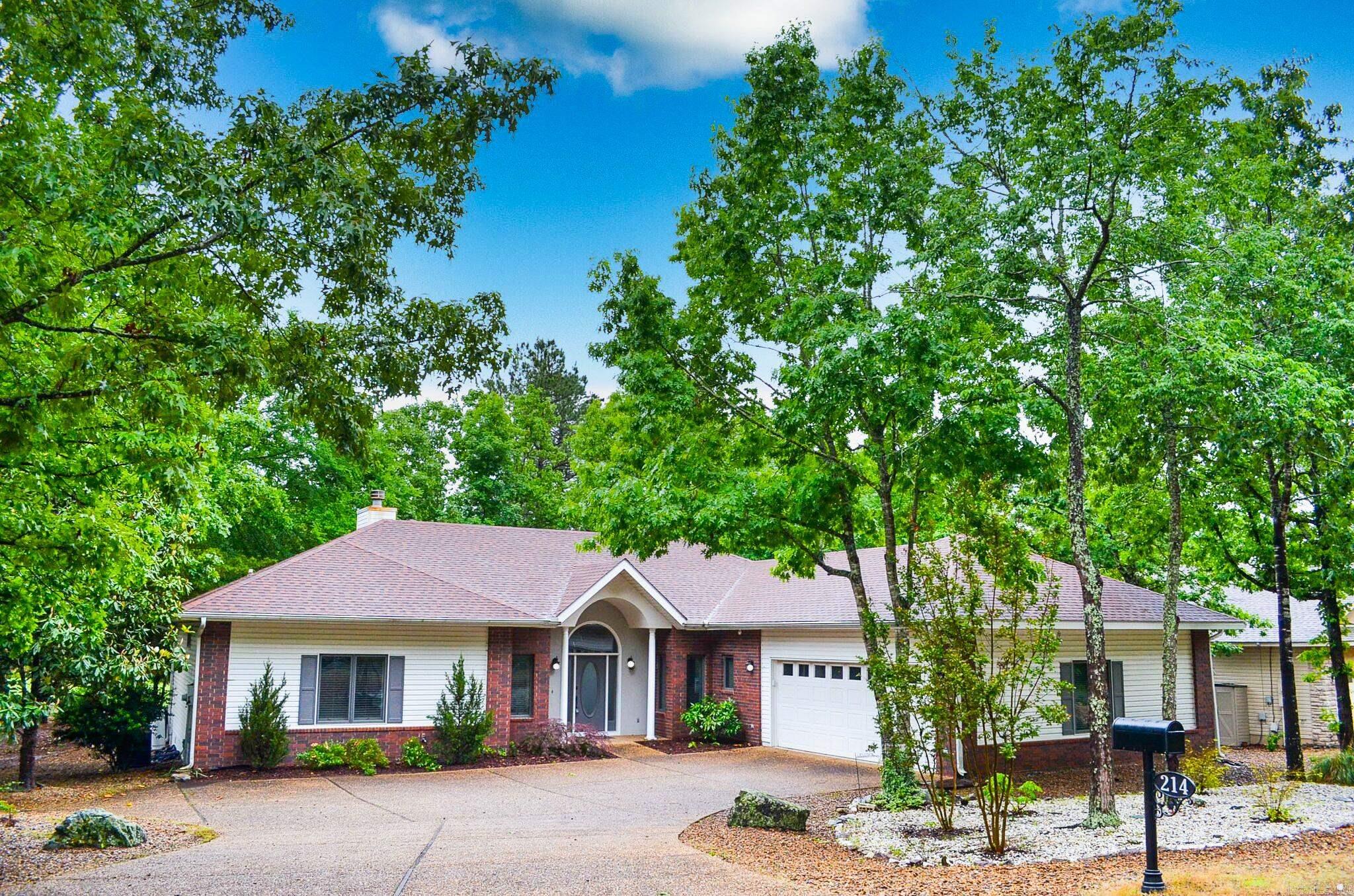 Welcome to 214 Pizzario Drive in beautiful Hot Springs Village, Arkansas! Situated on the Isabella Golf Course, this well-maintained 3-bedroom, 2-bath home offers 2,454 sq. ft. of comfortable living space and stunning golf course views in one of the nation’s largest gated communities.  Built in 1999, this home features a spacious floorplan with generous living areas, abundant natural light, plantation shutters throughout, and a layout perfect for both everyday living and entertaining. Enjoy peaceful mornings and relaxing evenings overlooking the golf course while taking advantage of all the amenities Hot Springs Village has to offer, including 9 golf courses, 11 lakes, walking trails, fitness centers, dining, and more.
