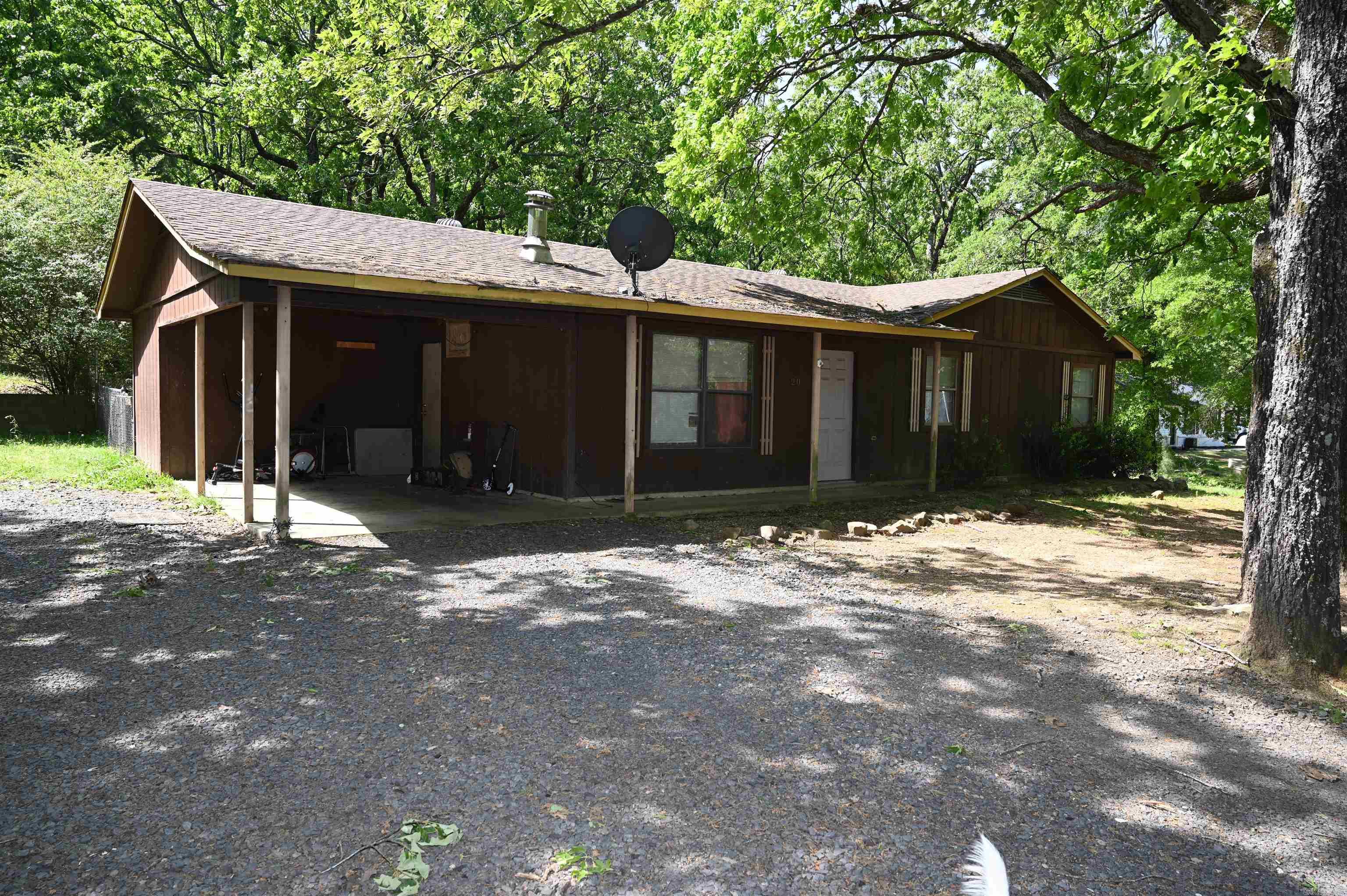 Spacious 2 acre property with an expansion potential in Rural Conway.  Situated on 2 acres with Conway mailing address, this property offers a rare combination of space, flexibility and future potential. The existing home features 2 bedrooms and 2 bathrooms with comfortable, functional layout. I deal opportunity for homeowners, investors or rental opportunities.  The expansive acerage provides ample room to build an additional home, guest house, or large shop building, making it an excellent option for multi-generational living, hobby space, or added income potential. Enjoy the privacy of country style living while remaining conveniently close to shopping, dining and all that Conway has to offer.  Whether looking for a place to settle with room to grow or a property with strong upside opportunity this one checks all the boxes.