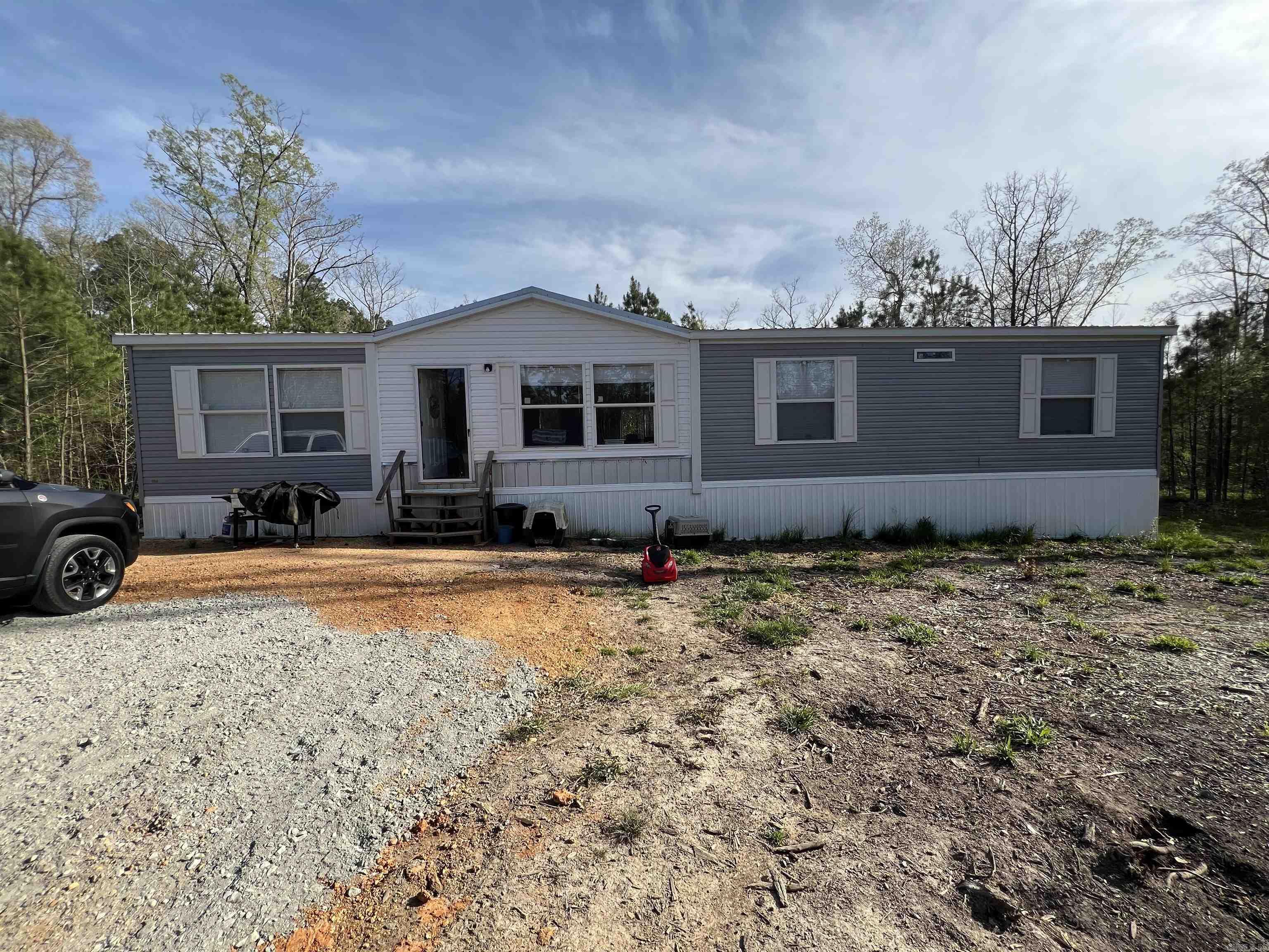 Beautifull and spacious mobile home on 10 acres! This property is convenient to Sheridan and White Hall. Give me a call to see this property today! Agents see remarks.