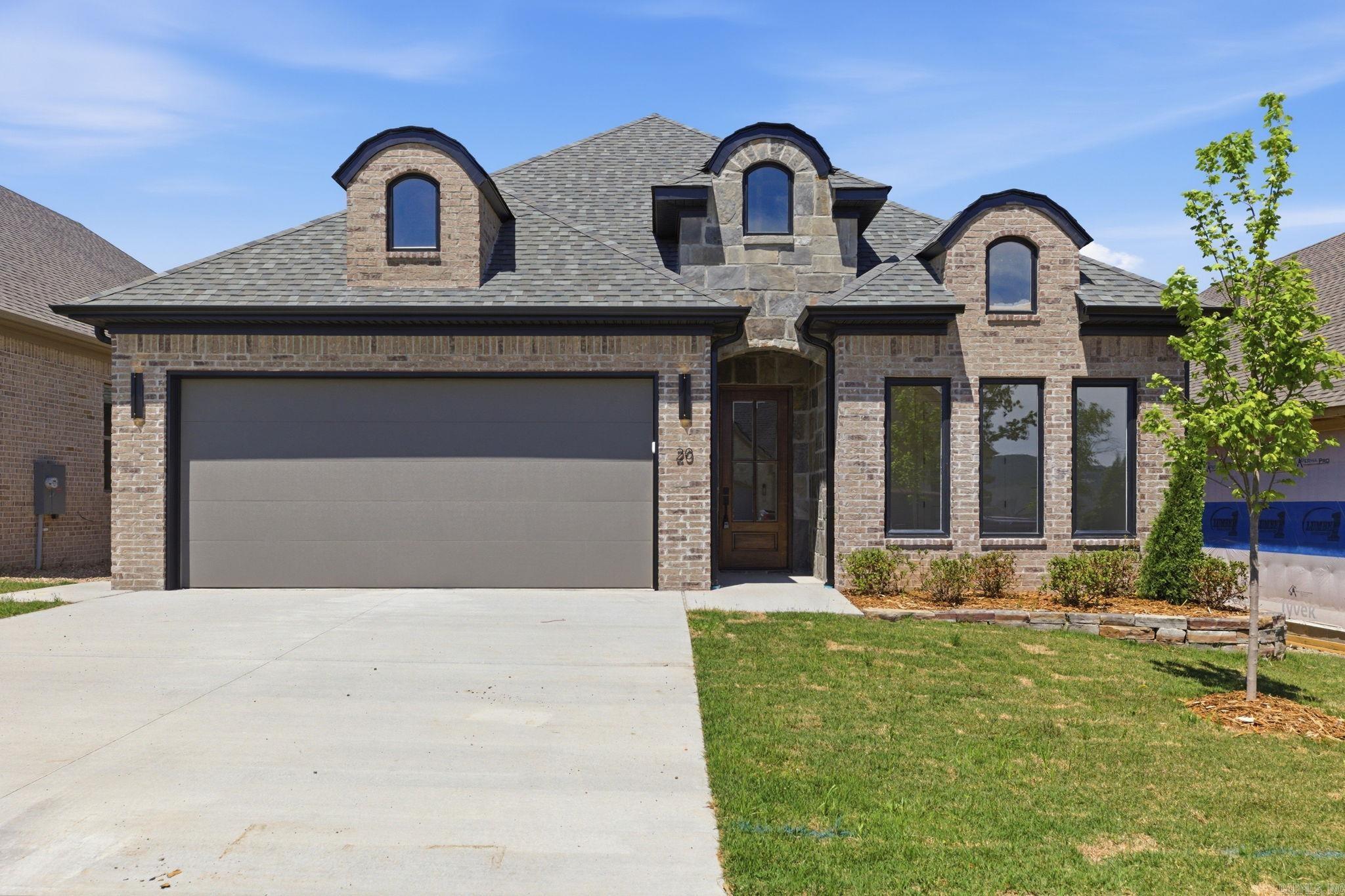 We're excited to introduce Mountain Brook, West Little Rock's newest neighborhood. This community is conveniently located off Highway 10, just behind The Ranch and only minutes away from Little Rock Christian, Joe T. Robinson, and Don Roberts Elementary.  This plan is a fan favorite: single-level residence, which beautifully combines craftsmanship and design. This home features four bedrooms and two baths with an effortless, thoughtful layout. The fourth bedroom offers great flexibility, perfect for a home office or other creative space. The primary suite is a true sanctuary, boasting a freestanding bath, a spacious walk-in shower, and a custom-designed closet. The heart of the home is a chef’s kitchen, complete with quartz countertops and custom cabinetry, seamlessly connected to a fully functional pantry. Call listing agent to tour home.