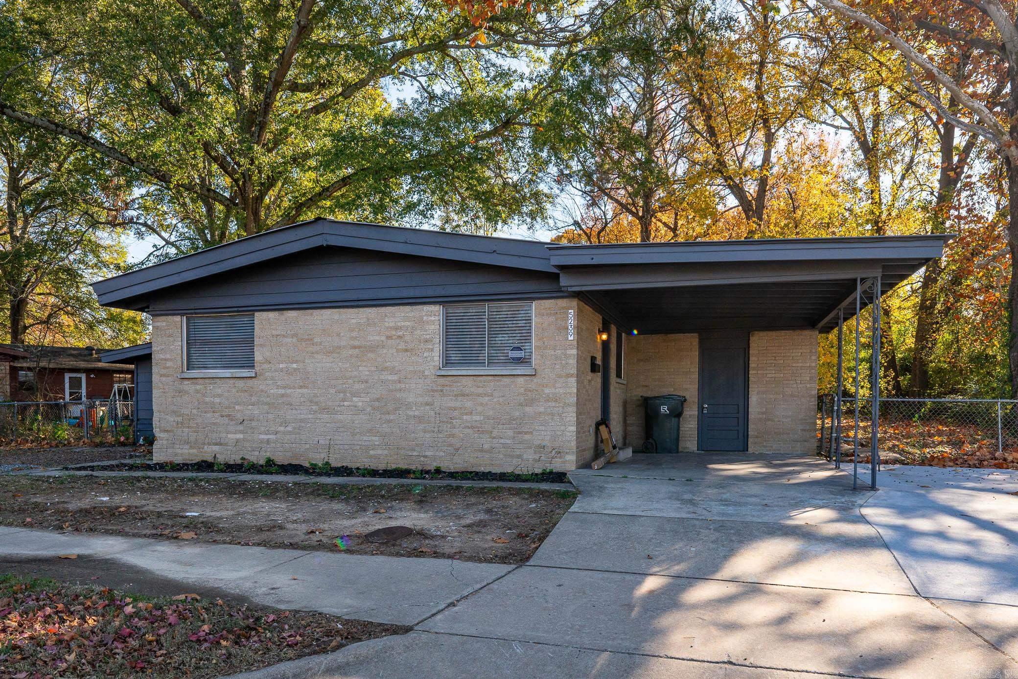 Great 4 bedroom, 2 bath home in Little Rock. All brick exterior and metal roof makes this home easy to maintain. New HVAC in 2022. Kitchen has been remodeled with new cabinets, new farmhouse sink and faucet, new garbage disposal, new dishwasher and granite counter tops. There is new luxury vinyl tile in every room except the hall bath. New lights, new bathroom cabinets, sinks and faucets.... There is new extended concrete parking area. Owner will consider owner financing.