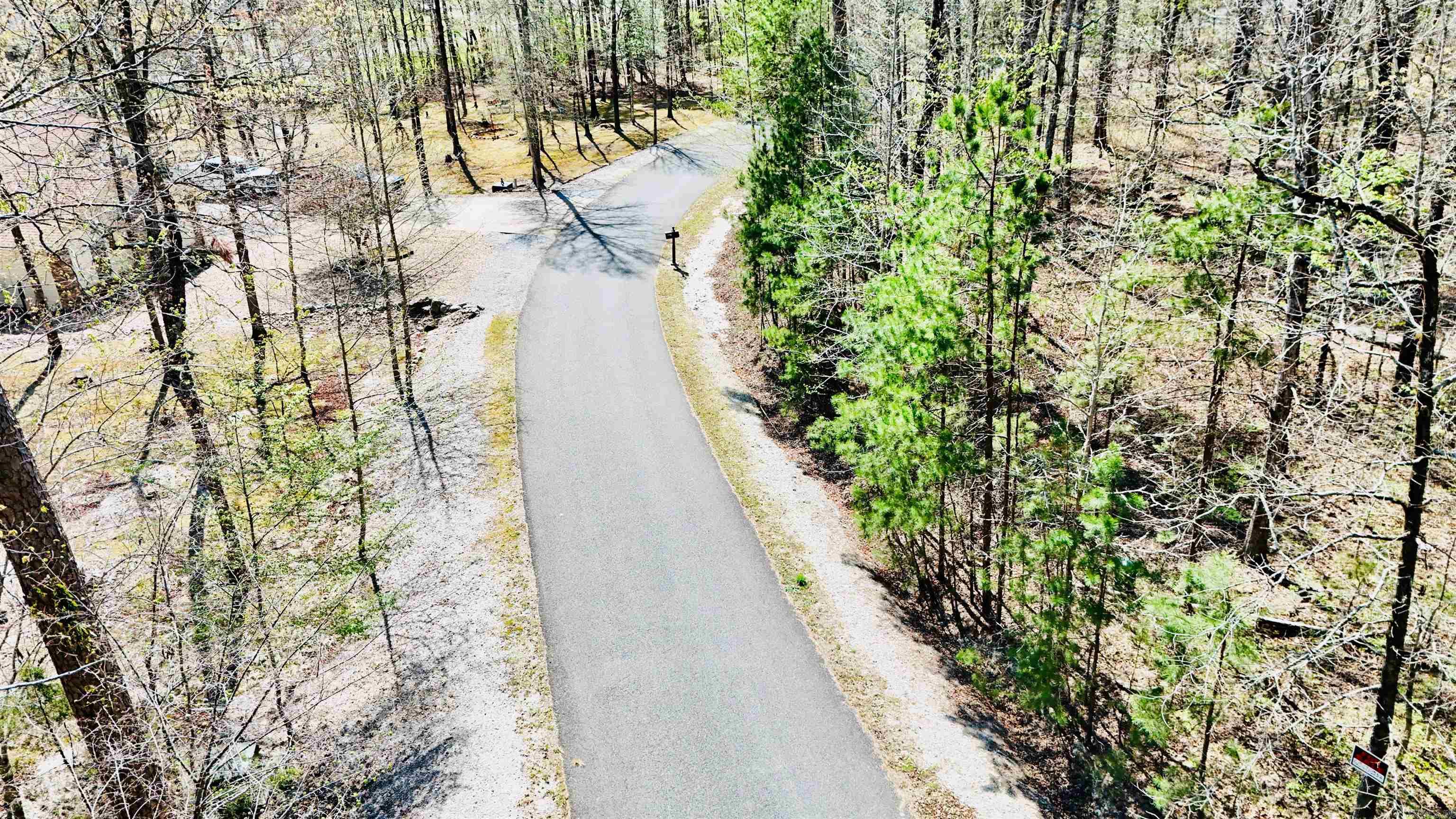 Build Your Dream Home in Hot Springs Village – 3 Andar Lane  Discover the perfect opportunity to build your dream home on this beautiful wooded lot located at 3 Andar Lane in Hot Springs Village. Surrounded by natural beauty and mature trees, this property offers a peaceful, private setting while still being part of one of Arkansas’ most desirable gated communities.  Ownership in Hot Springs Village includes membership in the Property Owners Association (POA), providing access to a wide range of amenities and lifestyle benefits. Residents enjoy a secure, gated environment along with access to multiple recreational opportunities and community features.  Hot Springs Village offers: 11 scenic lakes for boating, fishing, and water activities Several championship golf courses for all skill levels Over 30 miles of walking, hiking, and biking trails Fitness centers, tennis, pickleball, and recreational facilities Clubhouses, dining, and social activities A peaceful, well-maintained community with convenient access to nearby shopping, healthcare, and entertainment As one of the largest gated communities in the United States.