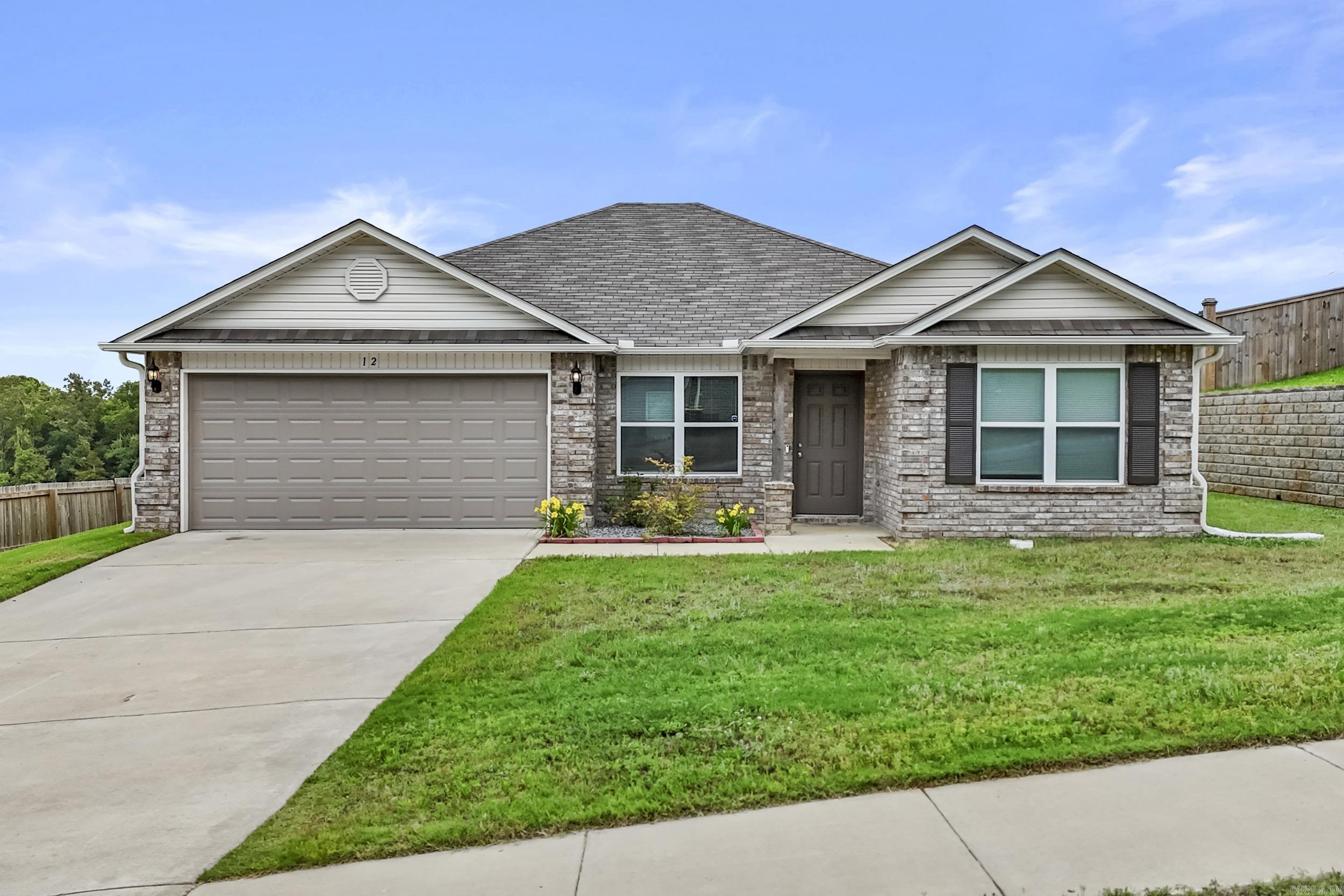 PAID OFF SOLAR PANELS and a 2023 build? That’s already a pretty good start. Add in 4 bedrooms, 2 baths, an open floor plan, and modern finishes, you’ve got a home that stands out in all the right ways. The spacious living area flows seamlessly into the kitchen and dining space, while the split-bedroom design gives everyone a little breathing room. Nice carpet, updated finishes, and a practically new home without the wait of building! In a neighborhood full of similar homes, this one comes with a major bonus… energy savings that could make your wallet breathe easier month after month. Some images have been virtually staged to illustrate the properties potential. Agents, see remarks.