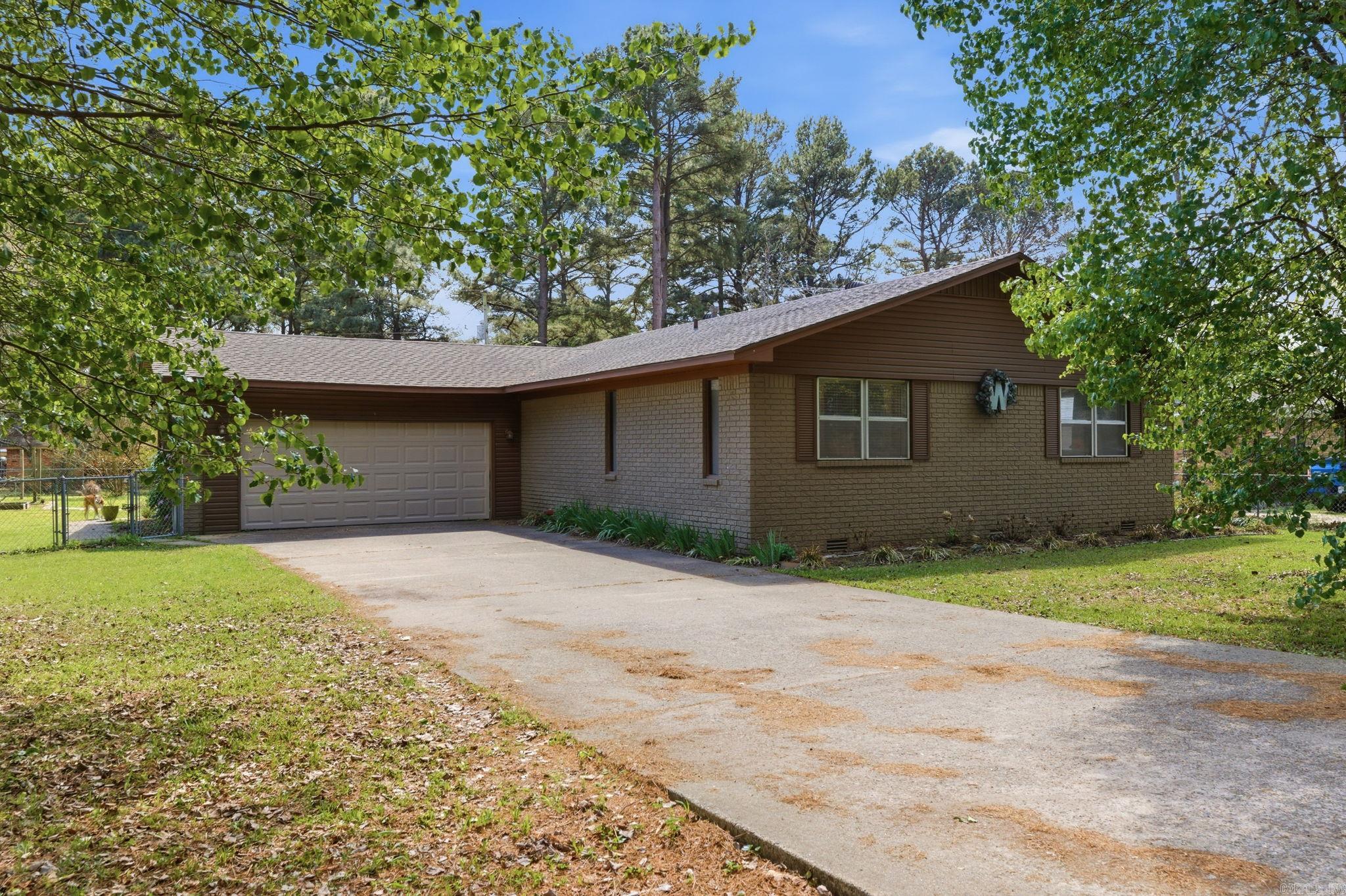 Welcome to 901 W Iowa St in the heart of Beebe! Perfectly situated in a convenient and peaceful location, this beautiful and unique home offers comfort, charm, and thoughtful updates throughout. Step inside to discover all new flooring, updated cabinetry, and numerous additional improvements that make this home truly move-in ready. The roof is only a year and a half old, offering added peace of mind for years to come. Outside, you’ll love the large fenced backyard featuring a play set, raised garden beds, and plenty of space to relax, entertain, or enjoy outdoor living. This property combines character, functionality, and a serene setting all in one. A rare opportunity to own a beautifully updated home in an established Beebe neighborhood!