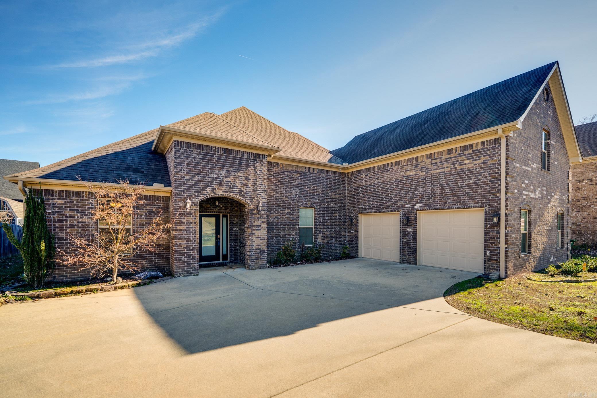 Seller willing to help with Closing Costs or Rate Buy Down! Welcome to this stunning all-brick home offering modern style and everyday comfort! Step inside to a bright and semi-open floor plan with soaring ceilings, wood-look tile flooring, and elegant archways. The spacious living area flows seamlessly into the gourmet kitchen, complete with granite countertops, subway tile backsplash, stainless steel appliances, and pantry. The primary suite is a true retreat, featuring a huge custom walk-in shower and plenty of closet space. Upstairs, a large bonus room can serve as a 4th bedroom, media room, or home office. Enjoy mornings and evenings on the screened-in porch overlooking the backyard. Additional highlights include solar panels (to be paid off at closing), an oversized 2-car garage, and an energy-efficient design. Conveniently located, this home combines style, space, and savings—ready for its next owner! See agent remarks.