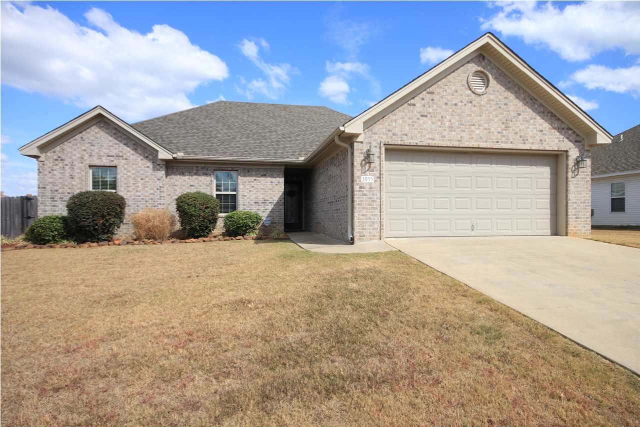 This home is spectacular! The vaulted ceilings in the kitchen and great room give a very spacious feel. The kitchen is large with lots of cabinets and opens into the great room which has laminate hardwood floors. Updated paint colors are throughout the home! The home has a wonderful level backyard with a patio that is great for entertaining!
