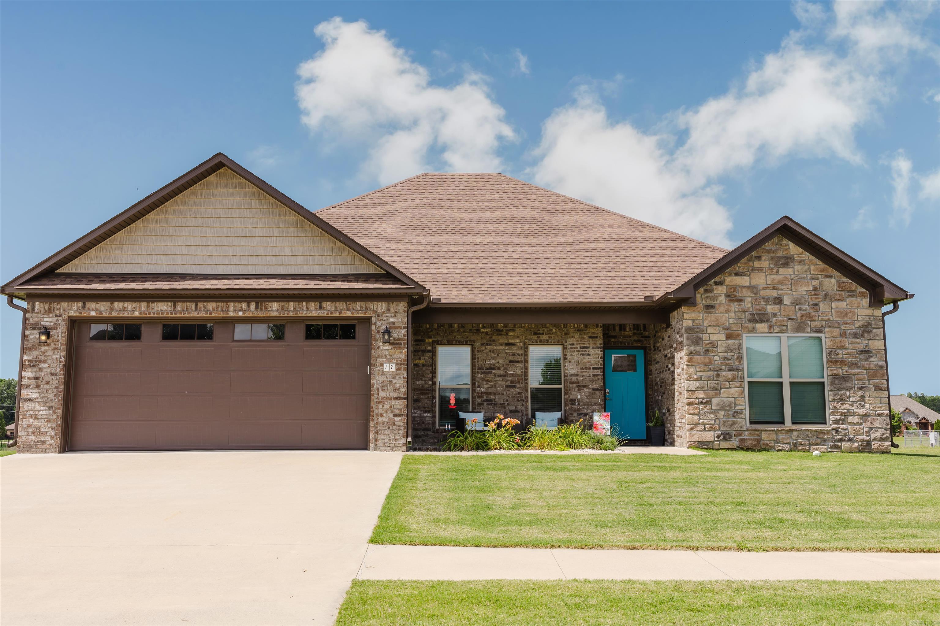 Impeccable 4BR/2.5BA one-owner traditional home in Vilonia on .51 acres! Features main-level living, an open floor plan, durable LVP, quartz counters, soft -close cabinets, and LG appliances.  Cozy up by the gas fireplace or relax in the primary suite with a jetted tub, walk-in shower, and built-in tornado shelter.  Upstairs boasts a bonus room with a private AC and half bath.  Covered patio, quiet neighborhood, tankless hot water, central vac, and spray foam insulation.  A must-see at 410,000.00.