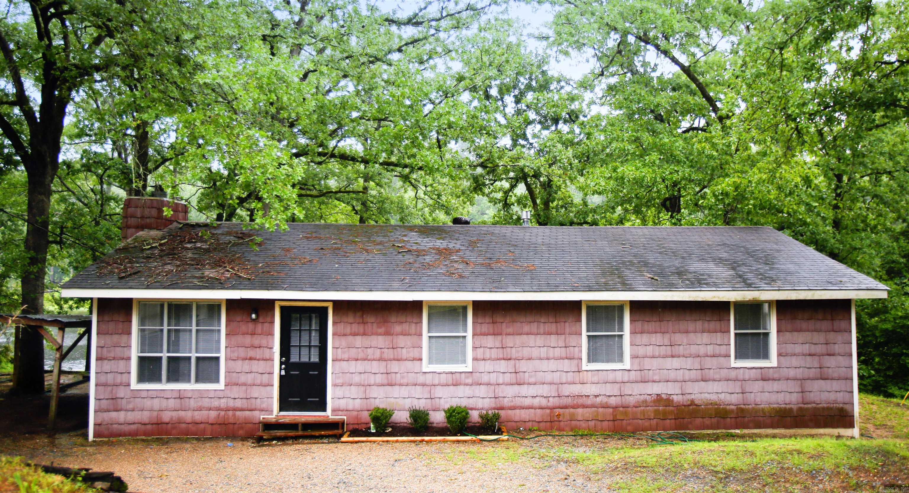 MOVE IN SPECIAL! HALF OFF FIRST MONTH’S RENT!! Secluded 4BD/2BA in Mabelvale that is waiting for you to call home. Decorative fireplace in living room. Vinyl flooring in main living spaces and carpet in bedrooms. Laundry room has hookups and extra cabinets for storage. This property is located on a small lake providing a serene environment. The lease for this property is for 2 years with a 3% increase after the first year and income has to be three times the amount of rent. This property does not accept section 8.