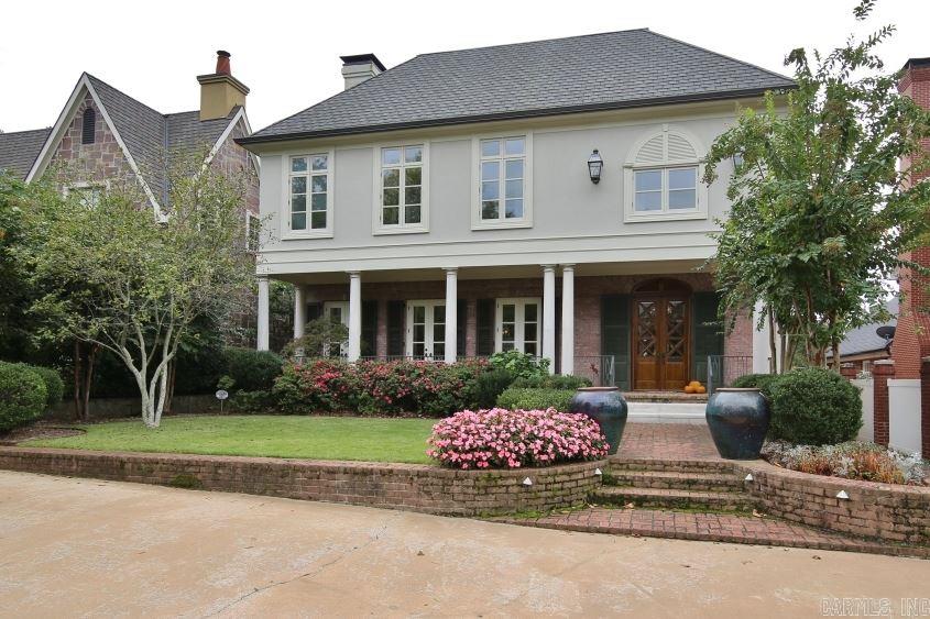 Spectacular European style home, custom built featuring high ceilings, hardwoods, iron & brass staircase, elevator, open floor plan, wide hallways and spacious rooms throughout.  Exquisite quality and exceptional architectural design & detail.  Two master suites (1 up & 1 down), office, gourmet kitchen with every amenity, charming private courtyard/patio.  Additional 430 sf (not included) access to guest quarters through first level.  Rear entry to garage.