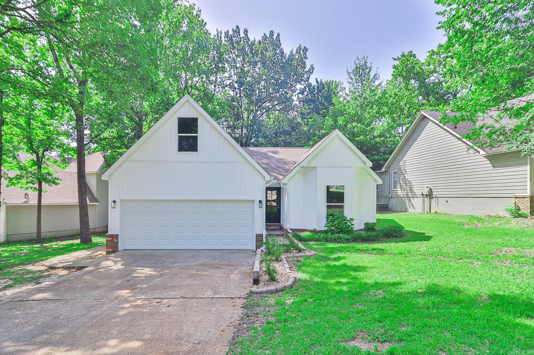 Welcome home to 1207 Hunters Run Cove located conveniently inside the bypass in the Jonesboro School District. This four bedroom, two bath home has been completely remodeled with all new finishes. Amenities include an attached two car garage, a fireplace, deck, and privacy fenced backyard. Call today to take a look! Nearly everything is new - kitchen, baths, flooring and fixtures!