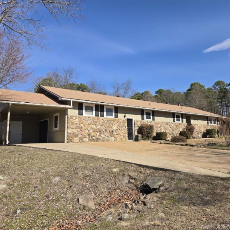 Don't miss out on this gem! Completely remodeled, with GOLF COURSE FRONTAGE! This property has had an extensive remodel including new cabinets, granite counters throughout, flooring, paint, appliances, plumbing fixtures and so much more. 3 bedrooms and 3 full bathrooms with a large bonus room, a separate office, and a golf cart garage. There is a large sunroom off the back with a beautiful view of the golf course. This home is move in ready and waiting for you. AGENTS SEE REMARKS.