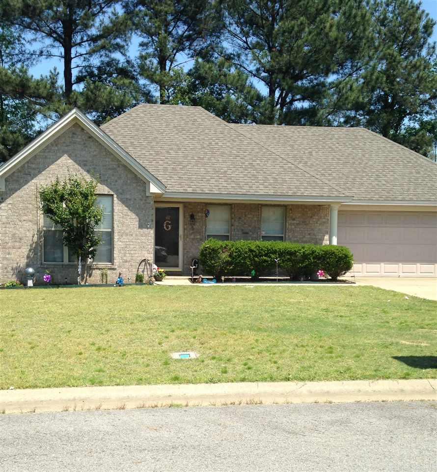 3 Bedroom 2 Bath Brick home. Spacious living room with wood laminate flooring.  Split bedroom floor plan. Stainless steel appliances, pantry, and walk-in closet.  Crown molding, ceiling fans, and new heat sensing alarm for fire and carbon monoxide. Tile flooring in kitchen, baths and utility room. Security system. Newly added deck and fenced in back yard.  Large shade trees along the fence line for shading.  2-car garage.