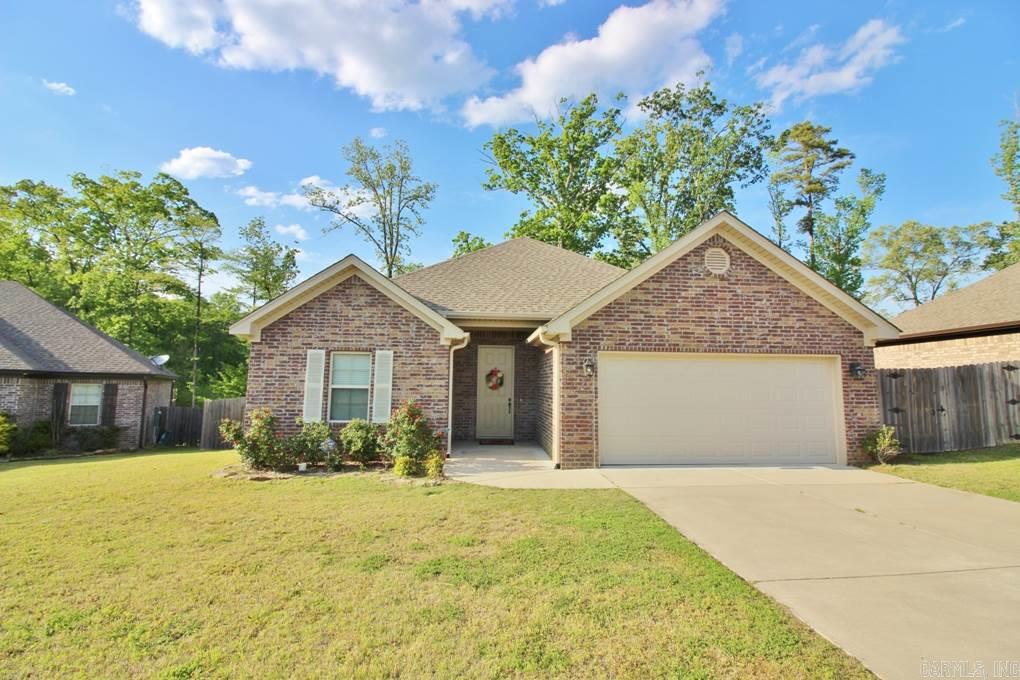 This Custom built home will Wow you from the moment you drive up! Manicured lawn leads you inside to the great room with 10' ceilings, shiny hardwood floors and windows overlooking private fenced backyard. Kitchen features granite countertops, breakfast bar, bright dining area with lots of cabinets and above cabinet lighting. Laundry goes into Oversized garage with great storage areas. Backyard deck and gazebo and huge patio is an entertaining dream area! Really well designed and kept home! You will love it