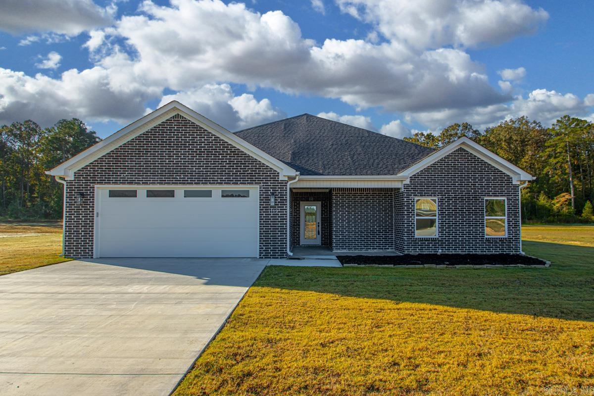 Charming new construction nestled on 1.12 acres! Discover this stunning 4 -bedroom, 2-bathroom home featuring a spacious open split floor plan, cozy fireplace and luxury vinyl plank flooring.  The Kitchen boasts a pantry, ss appliances, granite countertops and large island perfect for entertaining your friends and family! The primary suite has his-and-hers walk-in closets, walk-in tile shower and soaking tub.  Come see all that this new subdivision has to offer!!