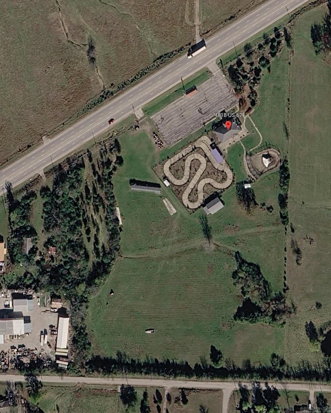Over 11 acres located next to The Zone. Property has Highway 62 frontage and also access from County Road 608/Buford. Property will have easement for the septic access from The Zone.
