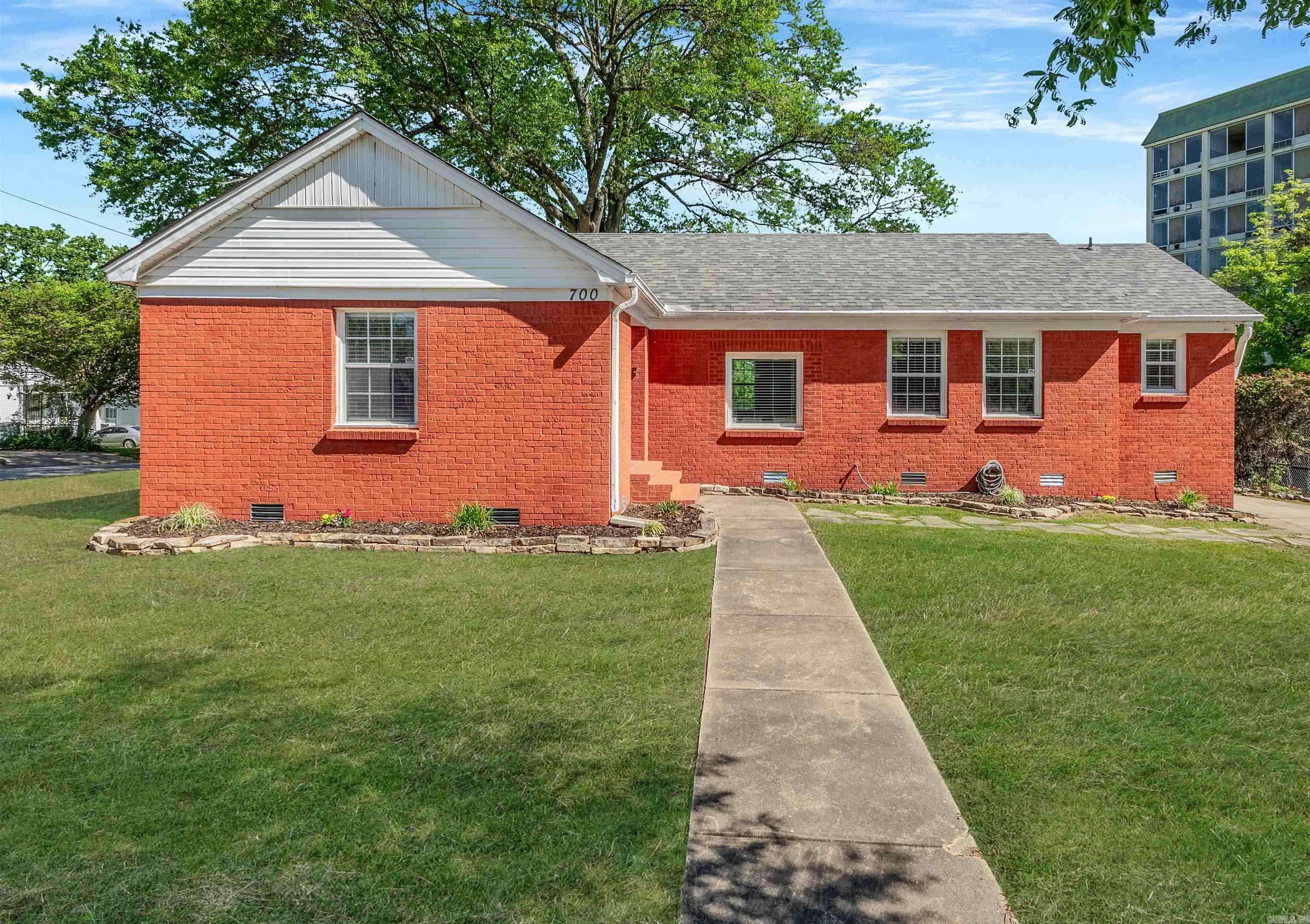 PRICED TO SELL!  Beautifully renovated home, perfect for family or small business (zoned O-3)!  Brick 3/2 on CORNER lot in the desirable Pettaway neighborhood.  Featuring modern updates and stylish appeal, this residence is short walking distance to popular local restaurants, coffee shops, and breweries, and minutes from the Arkansas Museum of Fine Arts, MacArthur dog park, and other downtown amenities such as Pettaway Square.  Digital-ready property w/3-tier security system, spacious backyard- perfect for outdoor gatherings, and parking for 3.  Exceptional home in a vibrant, trending community!