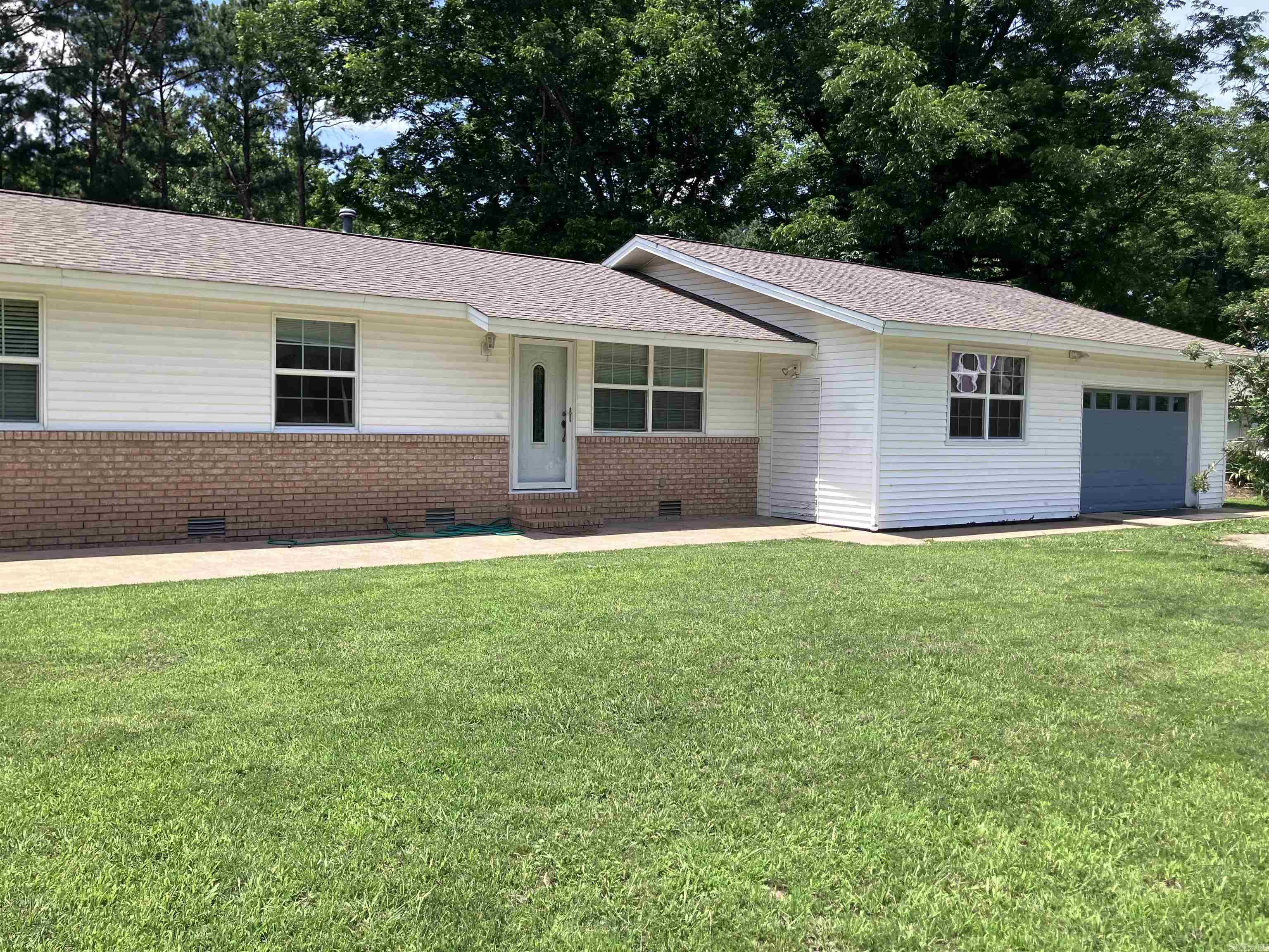 Welcome to this beautiful 4-bedroom, 2-bath home in a quiet neighborhood! This well-maintained home features several recent updates, including fresh paint and updated flooring. The spacious master suite offers plenty of room not only for your bedroom furniture, but it also has space for a small office. You’ll also love the spacious laundry room with lots of cabinets and a sink. The hallway bathroom features a beautifully updated ceramic tile walk-in shower. Step outside to enjoy the oversized fenced-in backyard — perfect for kids, or pets. Additional features include a storm cellar, chicken coup, and plenty of room for a garden.  Agents, see remarks.