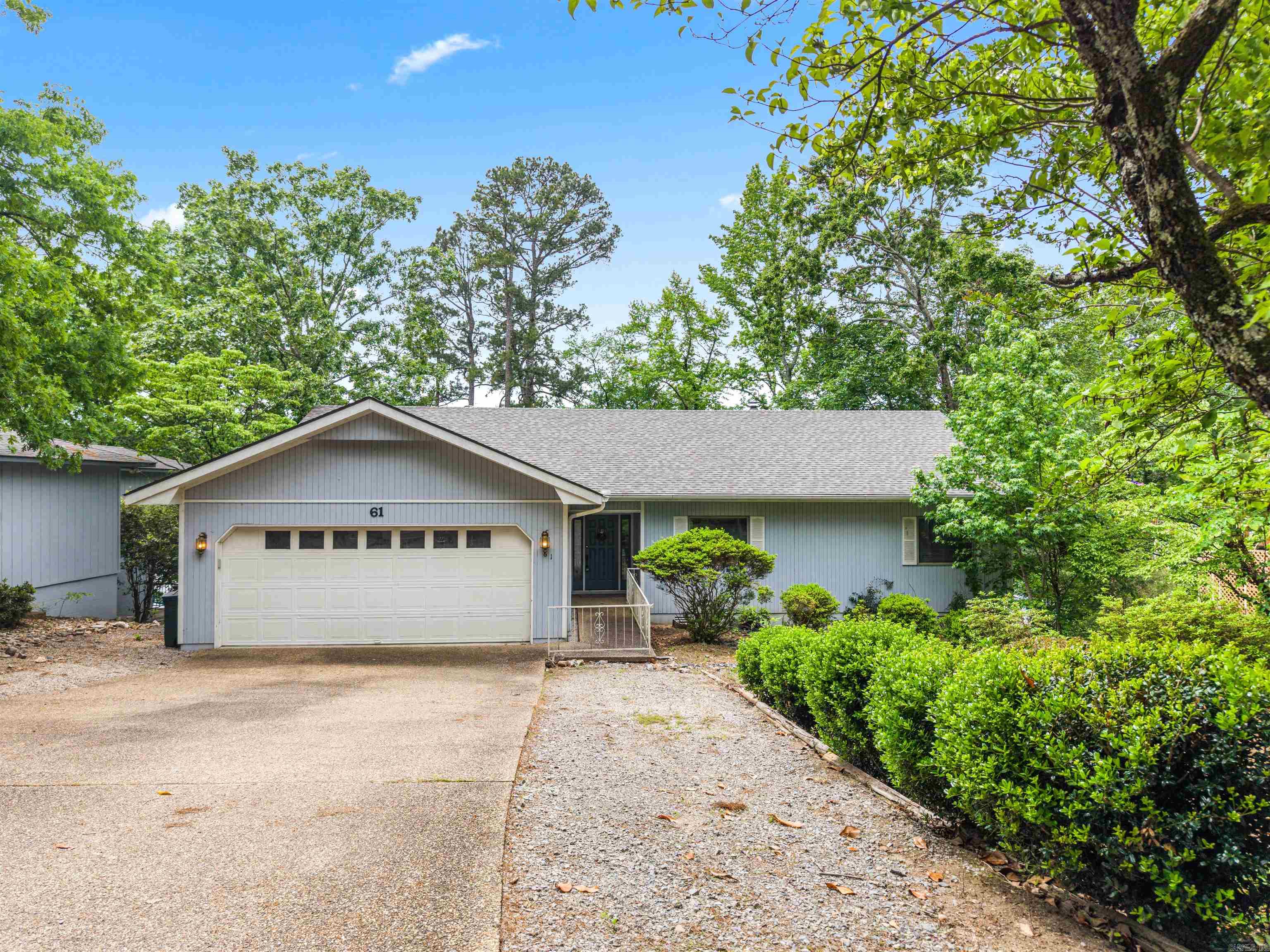 3 BED 3 BATH LAKE FRONT HOME WITH A SWIM DOCK! FISH OR SWIM RIGHT OFF YOUR OWN DOCK, OR BRING YOUR BOAT AND ENJOY THE CRUISING DOWN THE WATER! NEW ROOF 2026!  This Two-Story home with an open floorplan and a 2-car garage is centrally located in beautiful Hot Springs Village and just a couple a miles away from multiple golf courses and a state-of-the-art fitness center with an Olympic size pool, indoor track, full weightroom, bike, treadmills, fitness classes and more! It is also just minutes from indoor pickleball courts, excellent dining, nature trails, a beach, and dog park! Cozy up to the fireplace while enjoying fantastic views of the lake or entertain family and friends in the spacious sunroom or on the downstairs patio! This home is set up for convenient generational living with main living areas upstairs and down. It would make the perfect multi-level AIRBNB!  The large kitchen has loads of storage, and the spacious primary suite is the perfect place for relaxing! With some updating, this home could be your lake retreat! Call to see it today! MOTIVATED SELLER! Agent Remarks