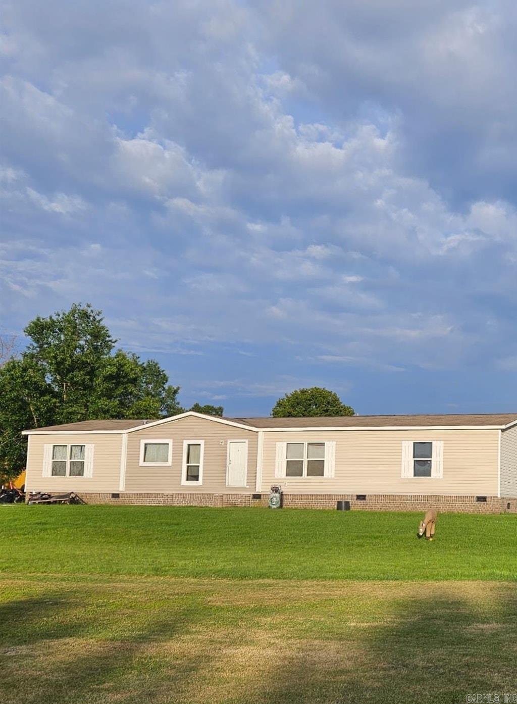 This property offers the convenience of being close to towns, schools and the beautiful Greers Ferry Lake while providing peace and privacy of nearly 18 acres. The spacious 4-bedroom, 2-bath home offers plenty of room to relax and enjoy country living. A 30' x 40' horse barn /shop adds versatility and could be an excellent setup for livestock, horses, hobbies or storage. With ample acreage and a desirable location, this property combines rural charm with everyday convenience.