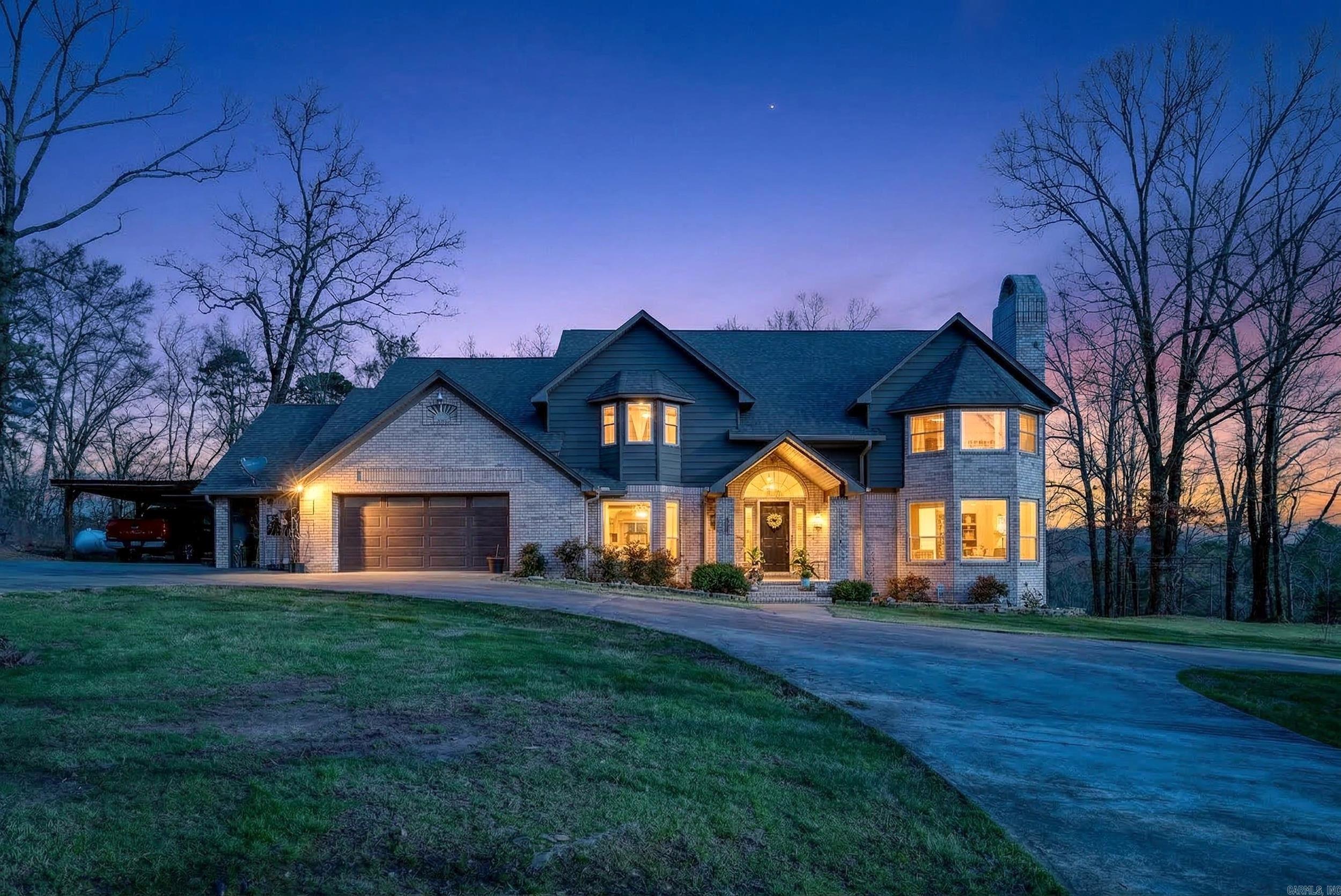Welcome to 1377 Cones Rd in Hot Springs where space and peaceful country living come together on 14.14 acres. Located just minutes from Oaklawn Racing Casino Resort, Magic Springs Theme and Water Park, and the beautiful lakes of Hot Springs, this property offers incredible potential for horse enthusiasts or anyone wanting room to spread out. This 4,267 sq ft home features an office, formal dining, formal living, and an additional living area. The kitchen includes granite countertops, tile backsplash, pantry, wall oven and microwave, gas cooktop, and an eat in area. Upstairs offers four bedrooms and three full baths. The primary suite includes a jetted tub, walk in shower, double vanities, and three large walk in closets. One bedroom connects to a loft leading to two third floor bonus rooms separated by a breezeway. Enjoy the large back deck overlooking the property. Outside features include a 40x50 shop with electricity, two carports, a storage building, chicken coop, and garden beds. Solar panels will be paid off at closing. Call today, your dream home awaits!