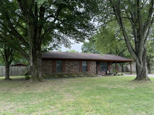 This is it! You've got to see this all brick home in the heart of Cabot. Close to schools and shopping. This well maintained 3 bedroom, 1 bath home offers comfort, functionality, and plenty of extra space. The home features a newly remodeled bathroom and a heating and air conditioning system that is only a couple of years old.  Outside, you'll find an extended covered patio. Lots of concrete for parking at side of home and goes on into the backyard.  It leads to a huge shop with a one car bay with approximately 720 square foot (30'x24'). Perfect space for hobbies, storage, or a workshop.  There's a separate storage buiilding for additional space and a convenient storeroom located off the carport. Whether you're looking for room to work, store equipment or simply enjoy extra space, the property has it all! Schedule an appointment to see it today! Agents see remarks