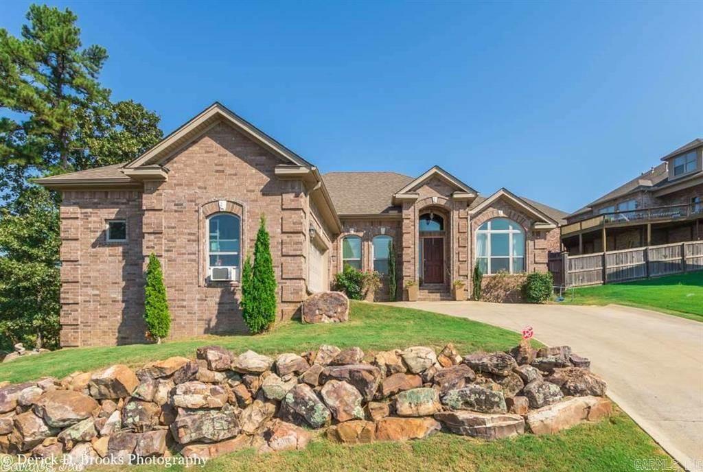 All Brick 1 level with gorgeous views. Built 2012 and has many improvements. New wood flooring. Master bath has new custom tilled shower, vanities & flooring. Freshly painted. Kitchen has painted cabinets, tile back splash, granite counters & breakfast bar. Open plan with high ceilings. Formal dining opens to great room & kitchen. Split master. Master has double tray ceiling, luxury bath, large walk in closet & hidden gun safe. Covered back patio & large back yard. Furnished. Minimum one year lease.