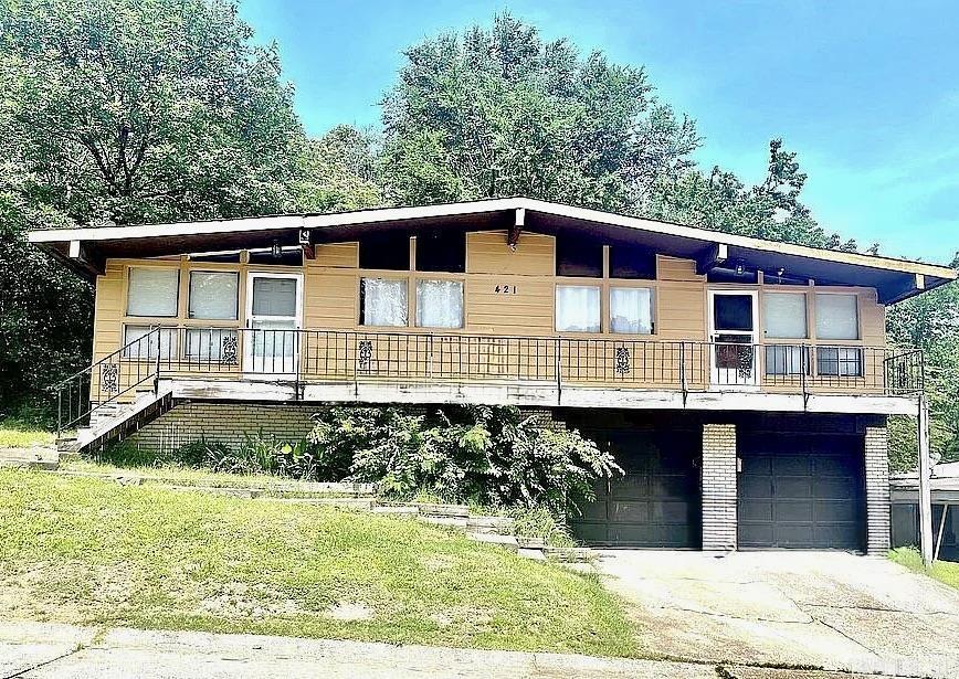 INVESTOR OPPORTUNITY! Duplex with one unit leased at $600/month (month-to-month) and one unit vacant—ready for a new tenant. Each unit is approximately 500 sq ft (1,000 sq ft total) with garage and off-street parking. Tenants pay all utilities and handle lawn care for low-maintenance ownership. Recent updates include new gas water heaters, updated plumbing and electrical, and HVAC units approximately 4 and 6 years old. Roof is approximately 10 years old. Refrigerator and stove convey; washer/dryer belong to tenant. Current annual income is $14,400 with projected rents of $600–$650 per unit. Taxes approx. $1,066/year and insurance approx. $1,200/year. Estimated CAP RATE approximately 7%–8% based on projected rents and typical expenses.