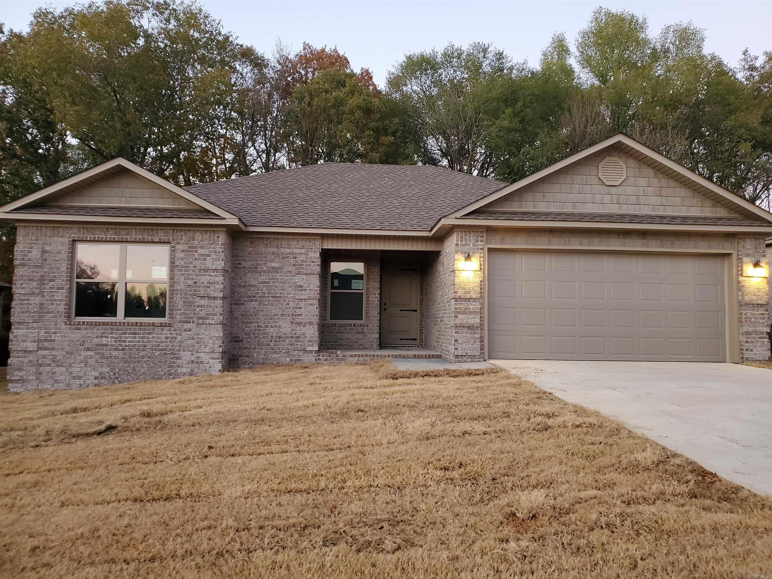 This Beautiful New Construction in a great location, is now ready for you to move in... (Construction is complete) This All Brick 3 Bedroom 2 Bath home features A Nice size Kitchen with lots of Cabinets, Beautiful Granite Countertops with a tile backsplash, Stainless Steel Appliances, Large Dining area all open to a large Living Room with lots of Natural light.  Master Bedroom features a Beautiful Pan Ceiling and  Barn Doors for Closet and Bath, Master bath has Double Sink-Large Vanity, Toilet room and a Huge Walk in Tile Shower. Other 2 bedrooms are nice size with great closets. Large Back Porch with a great view of the woods, Great for entertaining, Coffee in morning or quiet time watching the wildlife.  Sq ft is est. Pls Measure. Call Today and make this your New Home to Spend the Holidays in making New Memories!!   See Agent Remarks