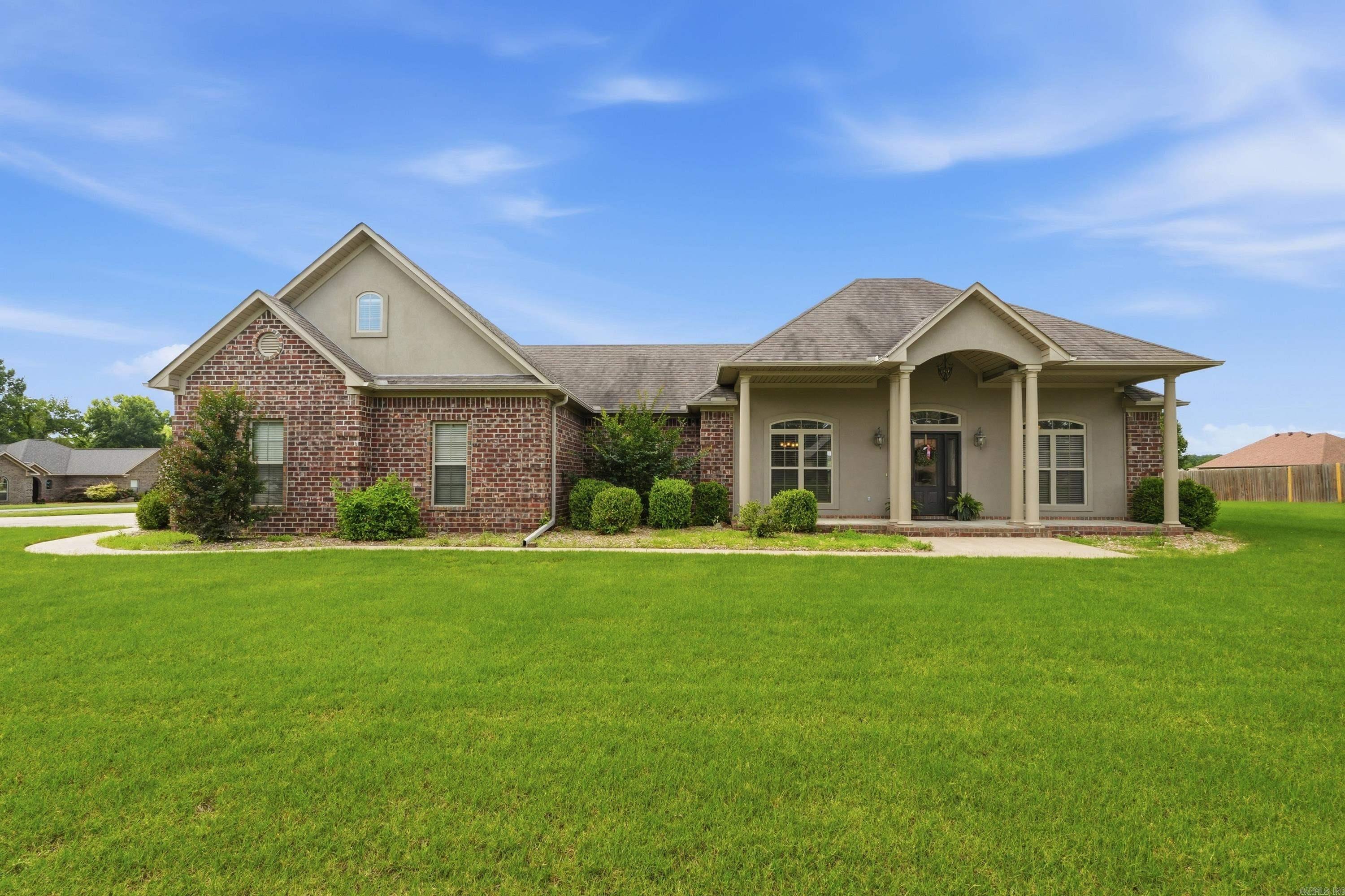 Move-in ready and meticulously cared for, this one-owner all electric home (propane fireplace only) offers a warm, functional layout in the desirable Springhill school district. Featuring a split floor plan with 3 bedrooms downstairs plus a 4th bedroom/bonus room upstairs, there’s room for everyone to spread out. Enjoy the large open kitchen, huge living room with fireplace, beautiful front porch, covered patio, and spacious backyard. The primary suite includes dual closets, Sink and Vanity, a soaking tub, and a separate shower with private access to the back porch — This home is calling your name!
