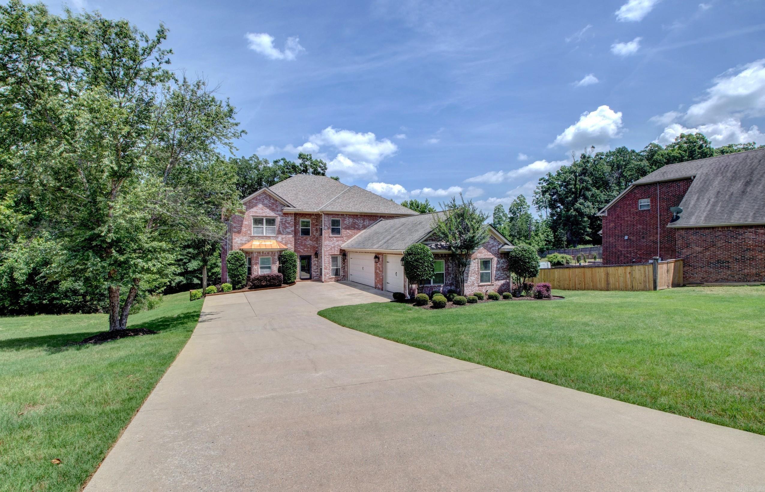If being in Osage Hills Addn is one of the boxes needing to be checked for your next home, then lets get your tour schedule today for this stunning beauty! It offers radiant floor to ceiling windows in the breakfast/kitchen area, both an office and separate library, huge master bed and baths, wood burning fireplace, and oversized three car side entry garage. Outside you'll enjoy the warmth from the wood burning fireplace on the large covered patio with a large backyard that backs up to green space. When you have the desire for more entertainment you can hop on your golf-cart and five minutes later you'll arrive at the beautiful Maumelle Country Club!  Which offers an 18-hole course with Arkansas River views, dining, swimming, tennis, and pickleball!