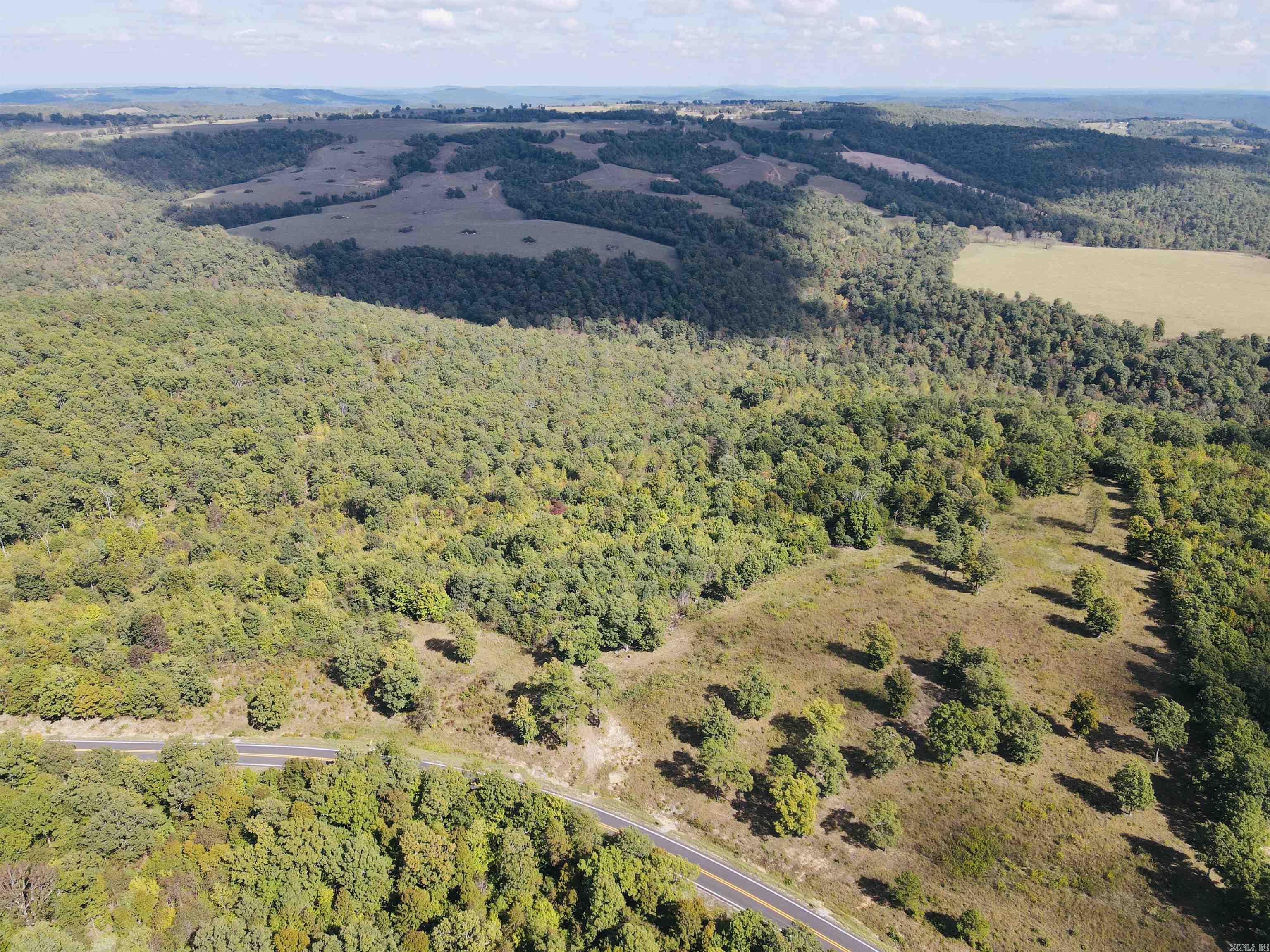 This beautiful 68± acre property offers the perfect blend of natural beauty, privacy, and convenience. Featuring a mix of pasture, woods, ATV trails, waterfalls, and a creek with natural springs, it’s an ideal setting for your dream home, cabin, or recreational retreat. With paved Highway 27 frontage and easy access to water, electric, and high-speed fiber, modern amenities are within reach while you enjoy the peace of mountain living. The land offers breathtaking mountain-top views and abundant wildlife, including whitetail deer, turkey, black bear, and numerous small game species. Whether you’re looking for a quiet homestead, a hunting paradise, or a place to explore and unwind, this property truly has it all.