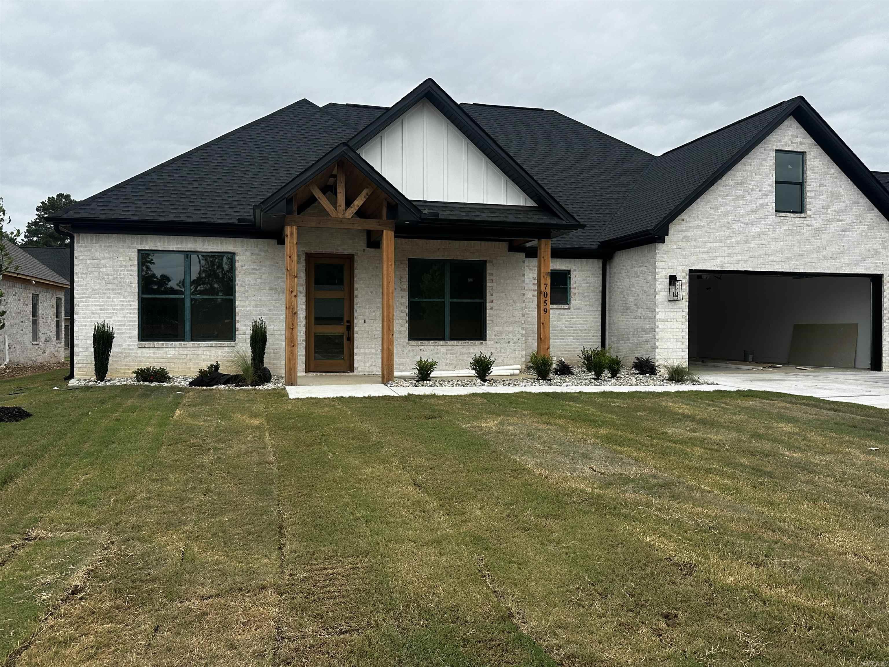 Welcome to this beautifully crafted new construction home in Hurricane Lake Estates, where classic design meets modern living. This all brick home offers 4 bedrooms, 3.5 bathrooms, with an office and a thoughtfully designed floor plan filled with upscale finishes and inviting spaces.  The open-concept layout features a stunning gas fireplace, quartz countertops throughout, and carefully curated details that bring warmth and sophistication to every room. The spacious kitchen flows seamlessly into the living and dining areas, making it ideal for entertaining or everyday life.  Located in one of the area’s premier communities, Hurricane Lake Estates offers exceptional neighborhood amenities including swimming pools, tennis courts, pickleball courts, playgrounds, and more. Enjoy the perfect combination of style, comfort, and community in a home designed for modern living.