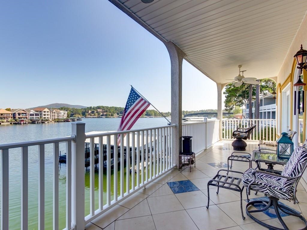 Welcome to Paradise Bay Condos! E-2 Offers 2680sf w/ 3 Bedrooms, 3.5 Baths, 2 Living Areas, and Upper & Lower Waterfront Patios. Features include a Large Kitchen with S/S Appliances, Big Breakfast Bar, Hardwood Flooring & Tile in the Main Living Spaces, Upper & Lower Wet Bars & 2 Master Suites! Freshly Painted! 20 Unit Gated Complex. Pool. Boat Slip. 2 Covered Parking Spaces. Elevator. Just a Short Boat Ride to Several Restaurants! Great Location by Water & Land! Big Views! Call Today!
