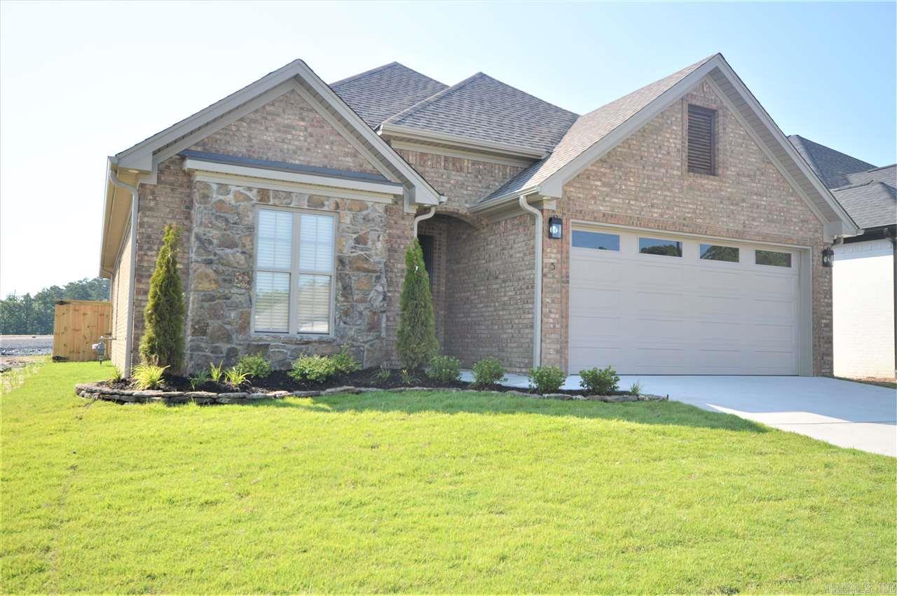 Presold- new Graham Smith Construction. One level open floor plan with a beautiful white kitchen open to the living room with wood beams in trey ceiling. Hardwood floors throughout main living spaces. Master suite has oversized tiled walk-in shower, custom cabinets in walk-in closet. Gas fireplace wrapped in tile and cedar. Fenced backyard.